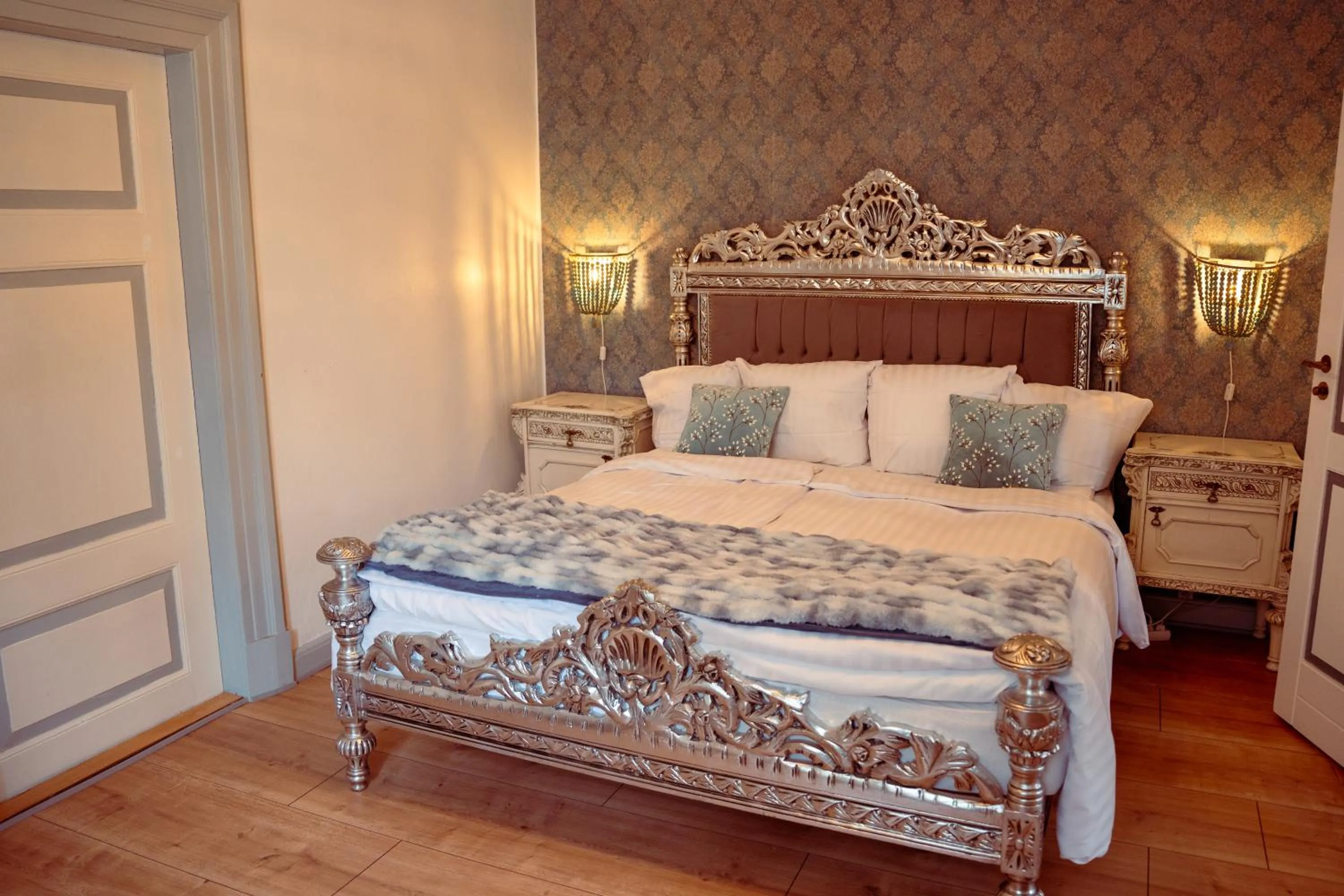 Bed in Boutique Hotel Postgården