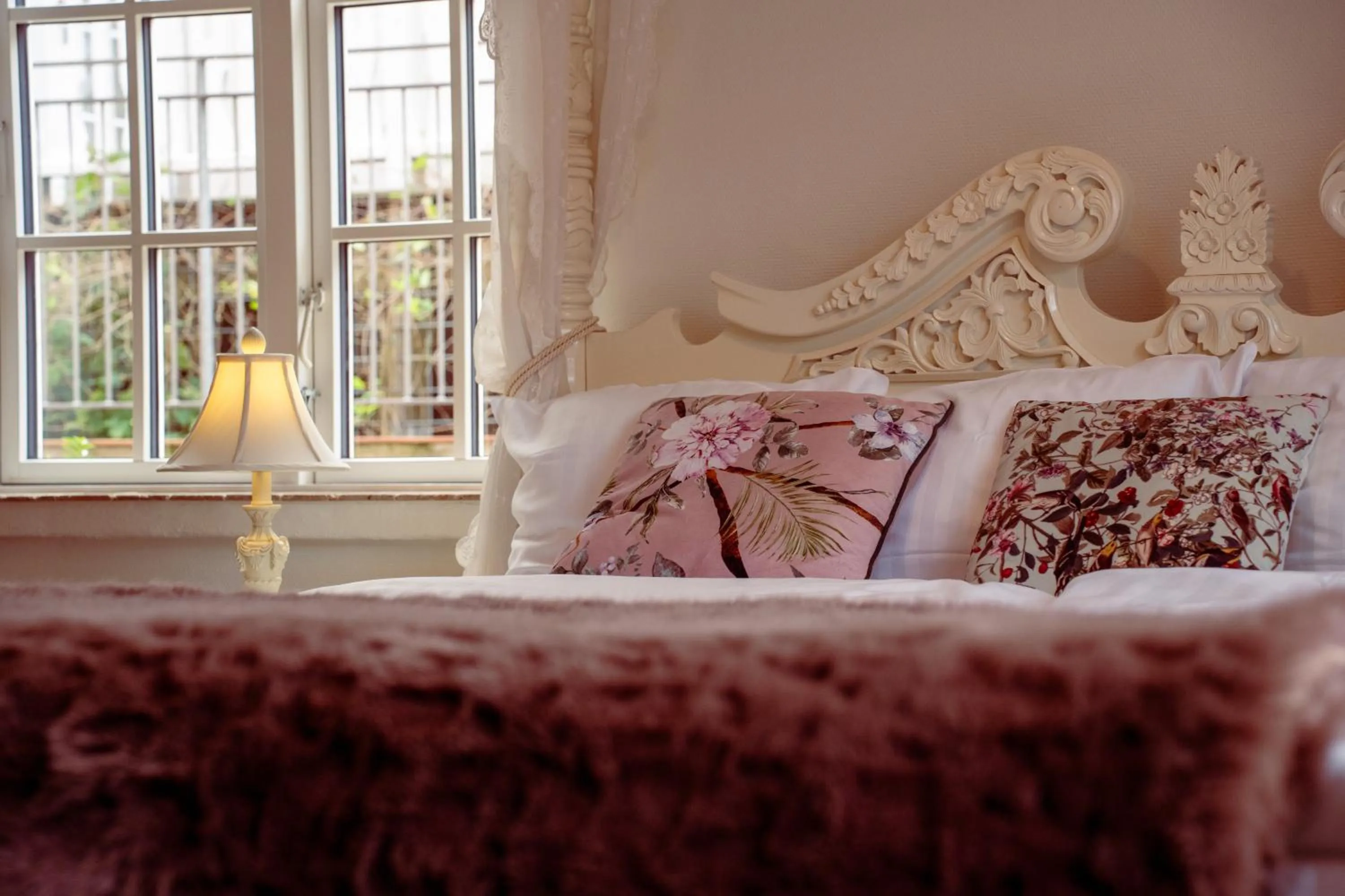 Bed in Boutique Hotel Postgården