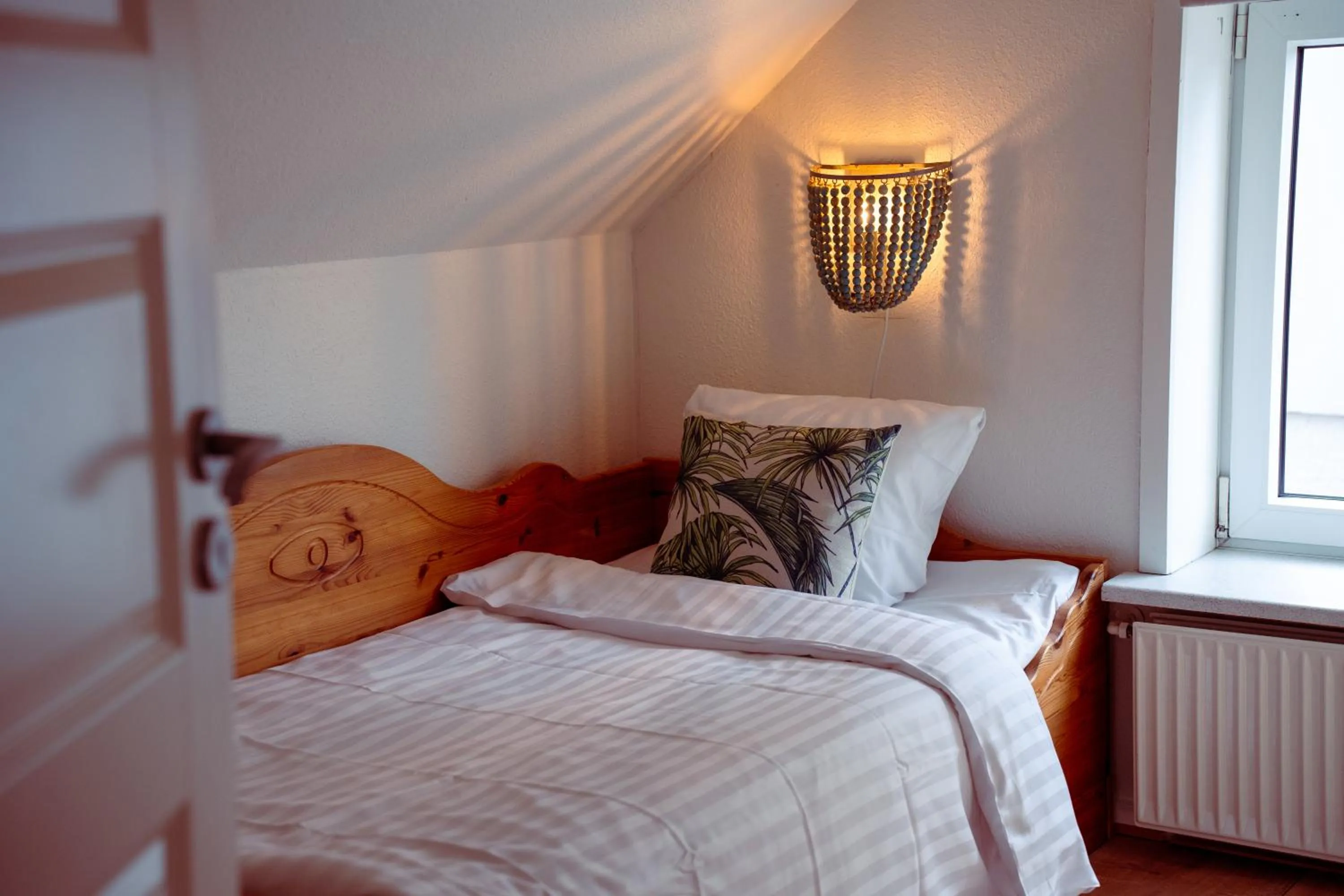 Bed in Boutique Hotel Postgården