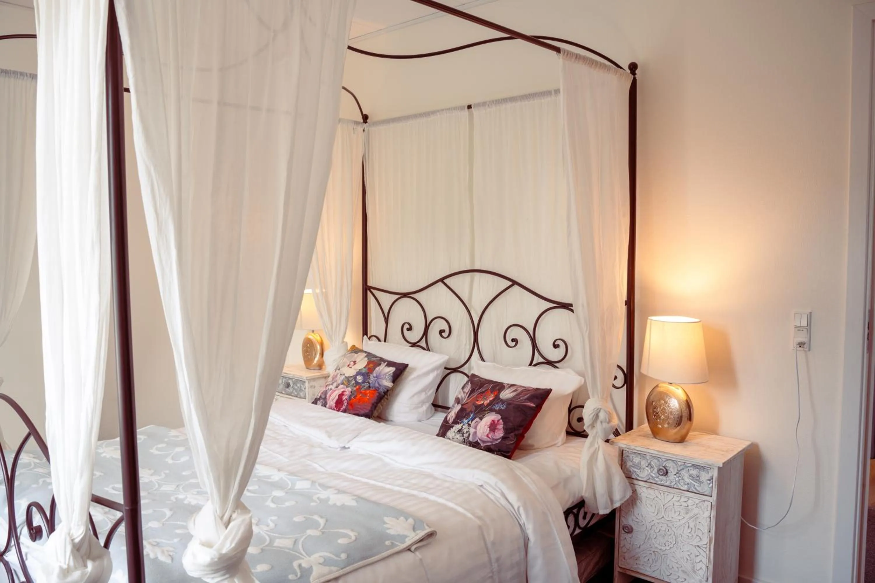 Bed in Boutique Hotel Postgården