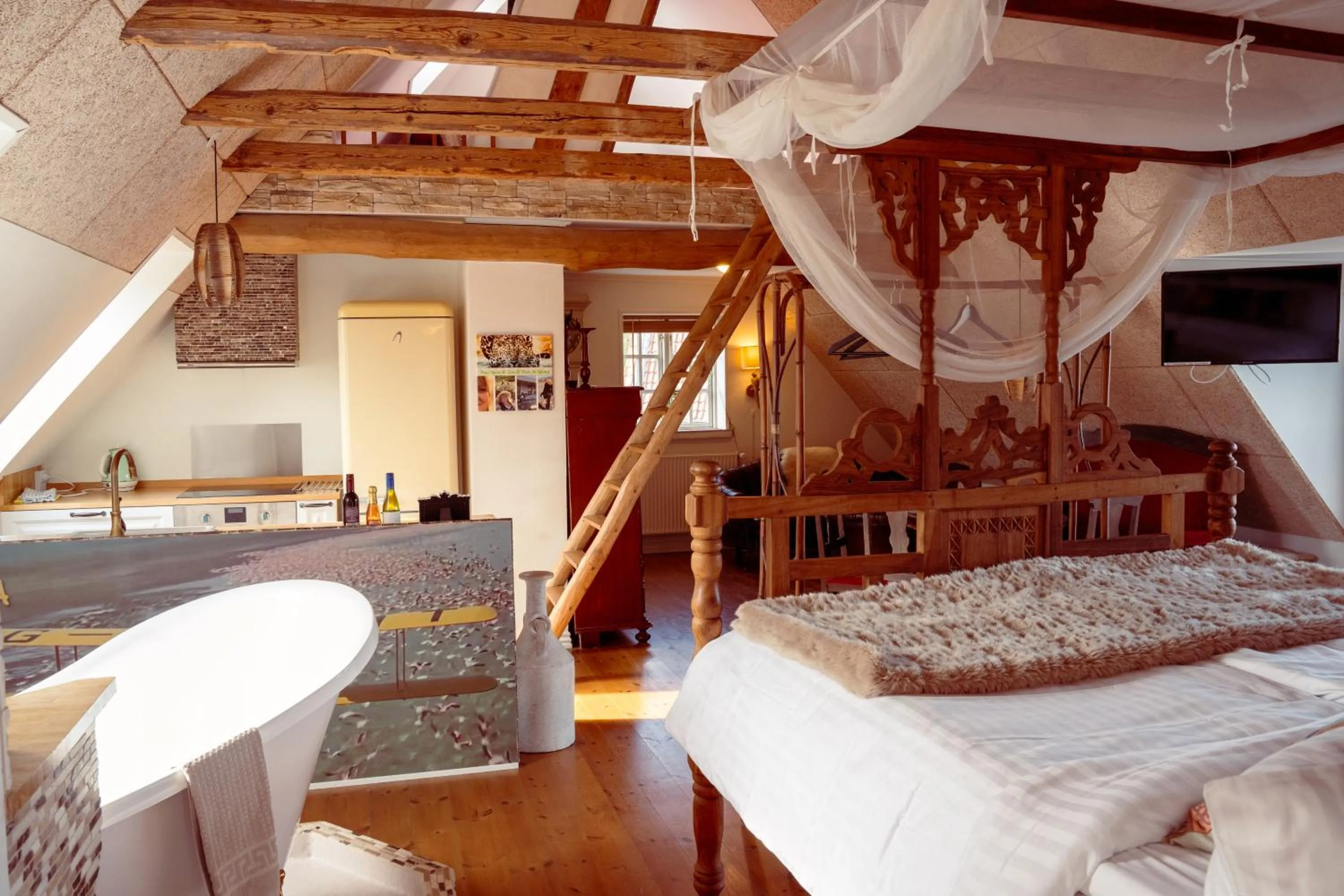 Bed in Boutique Hotel Postgården