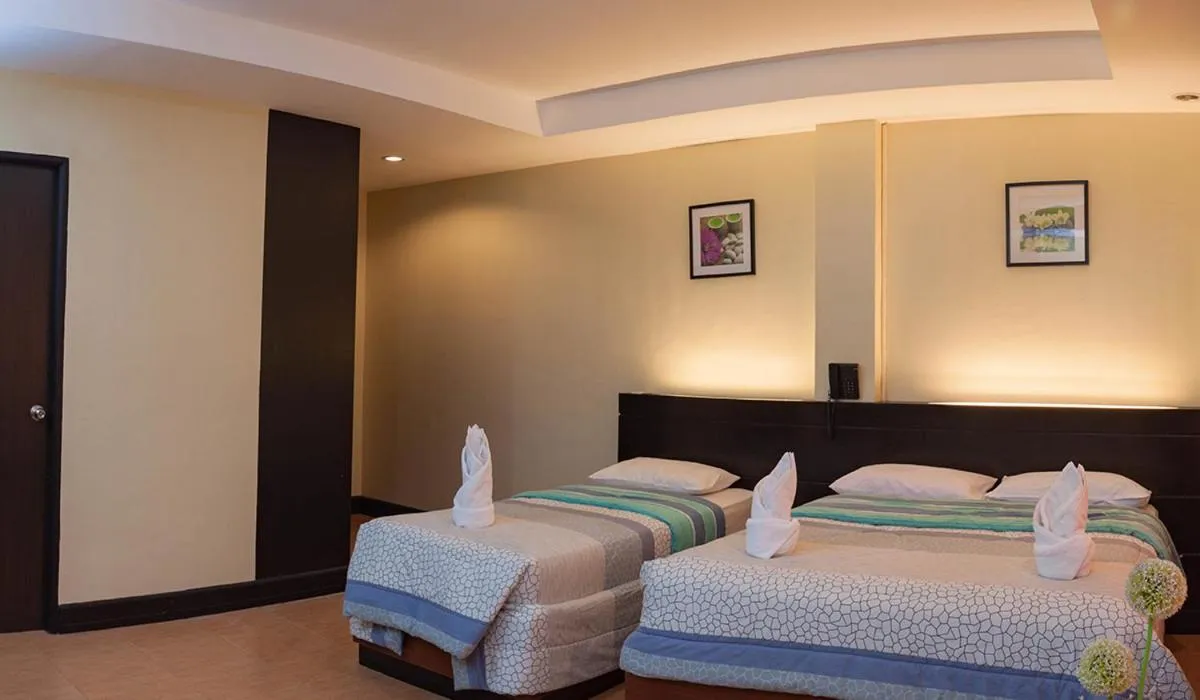 Bed in Siayan Travellers Inn