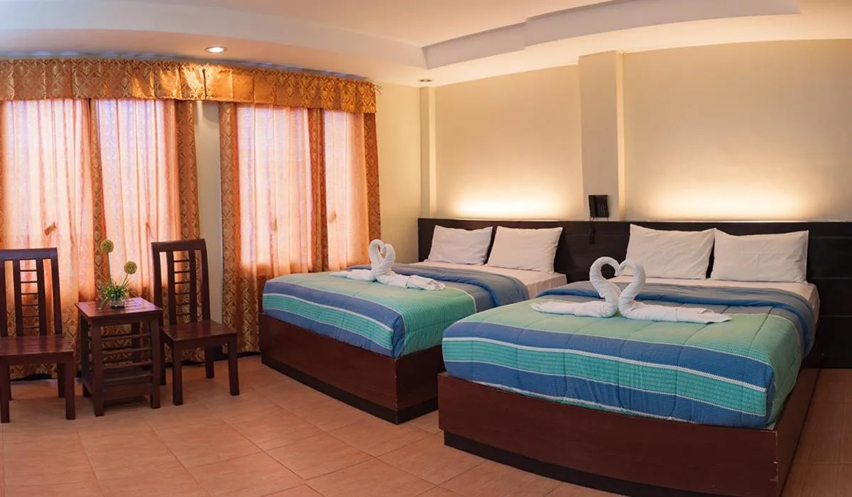 Bed in Siayan Travellers Inn