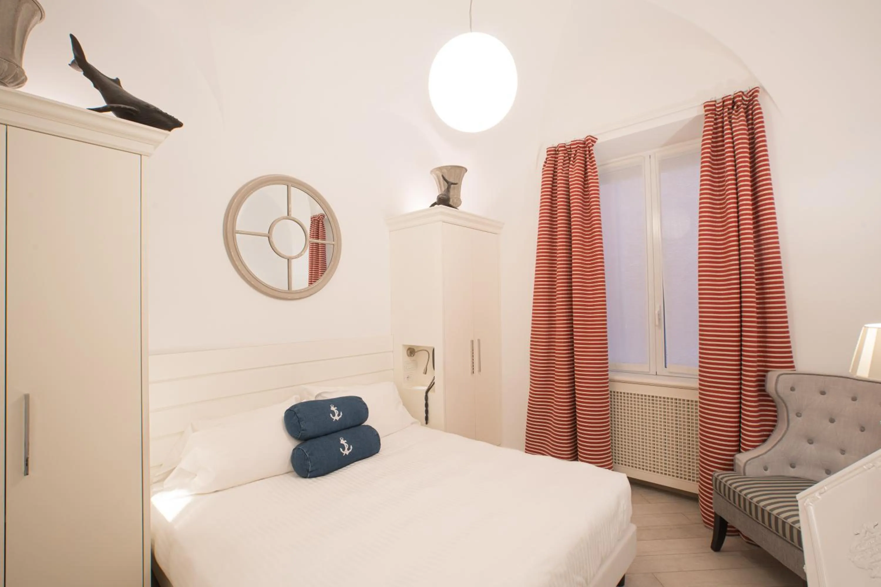 Bed in Hotel Marina Charming Rooms