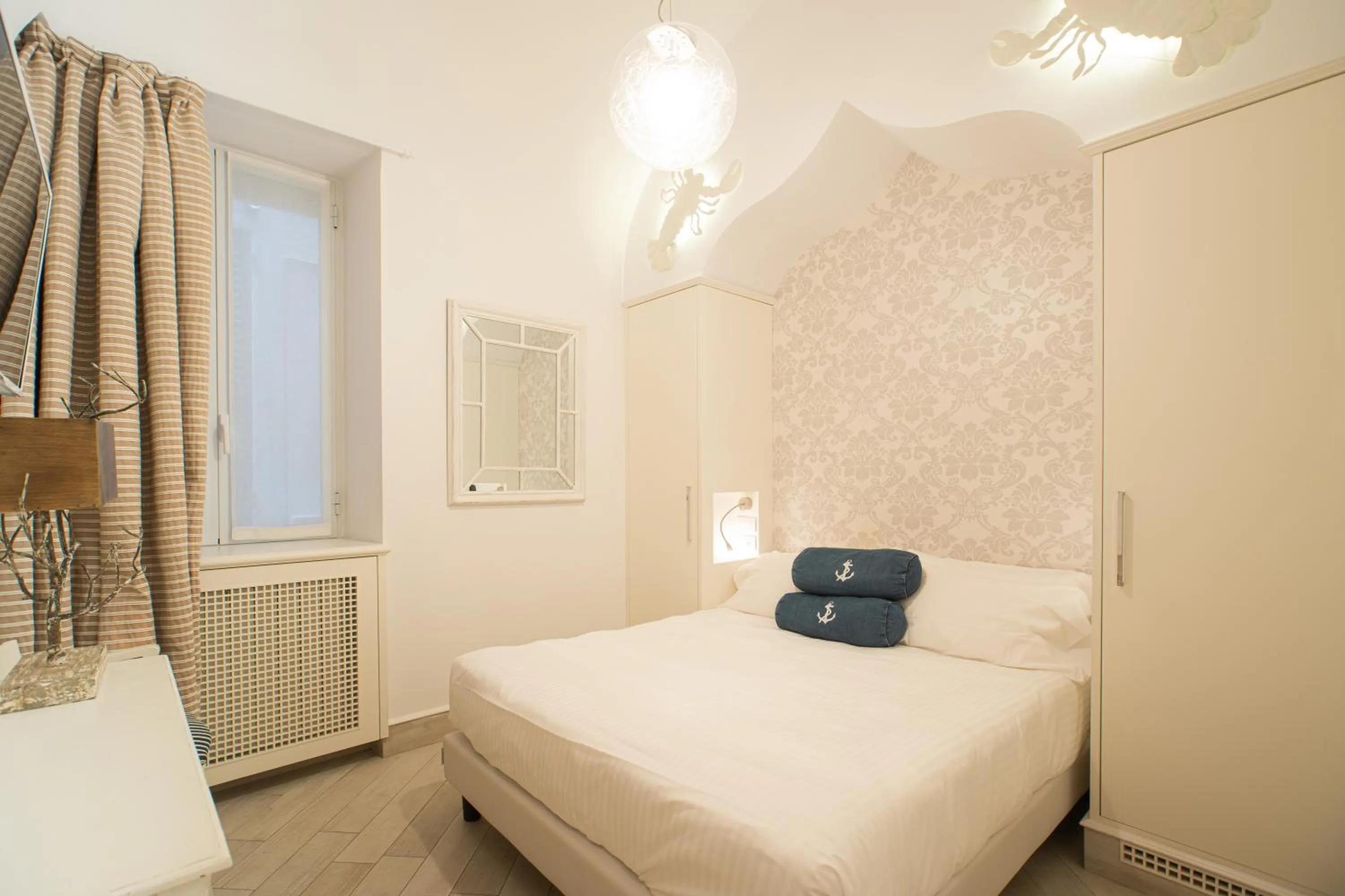 Bed in Hotel Marina Charming Rooms