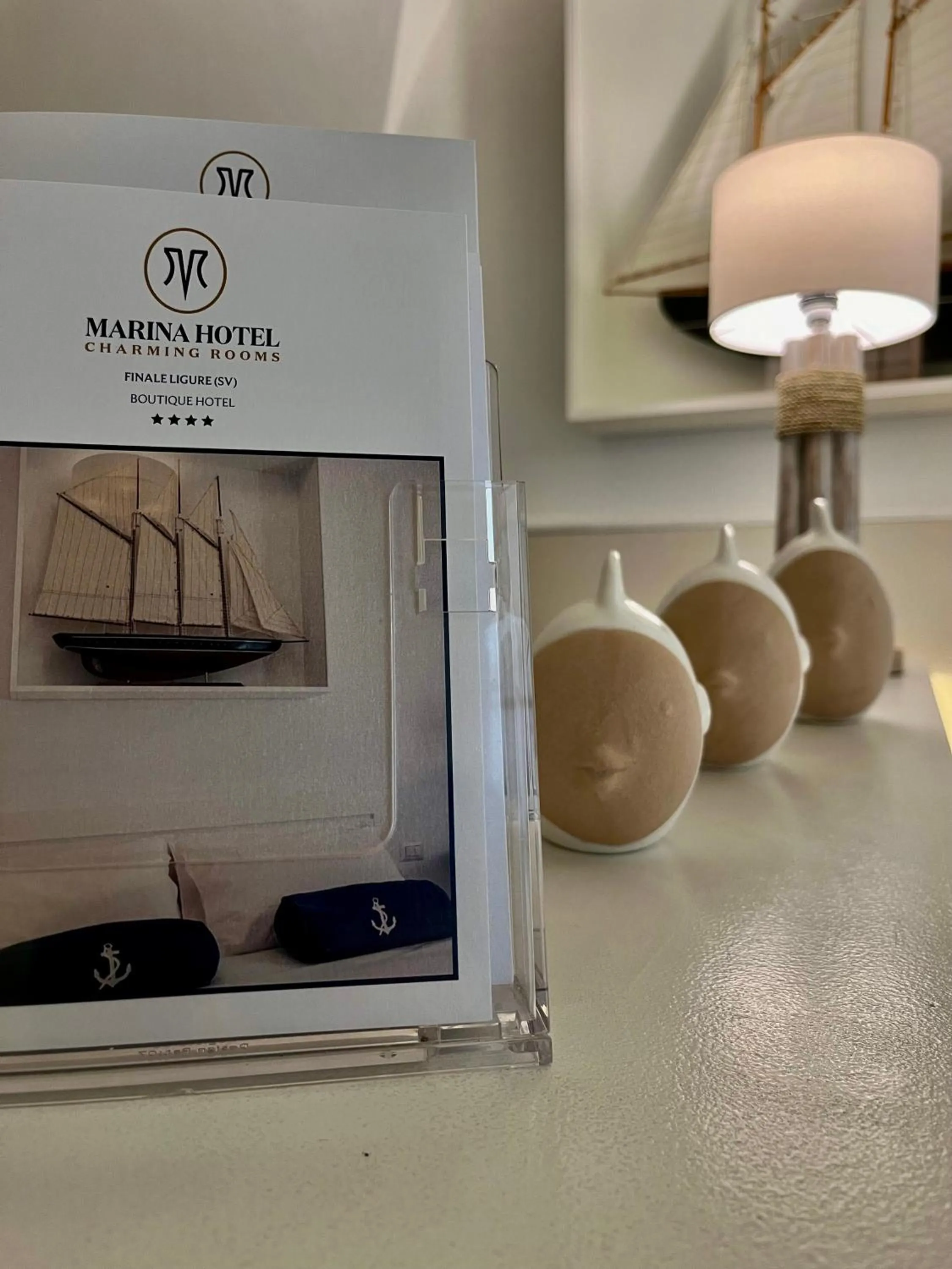 Property logo or sign in Hotel Marina Charming Rooms