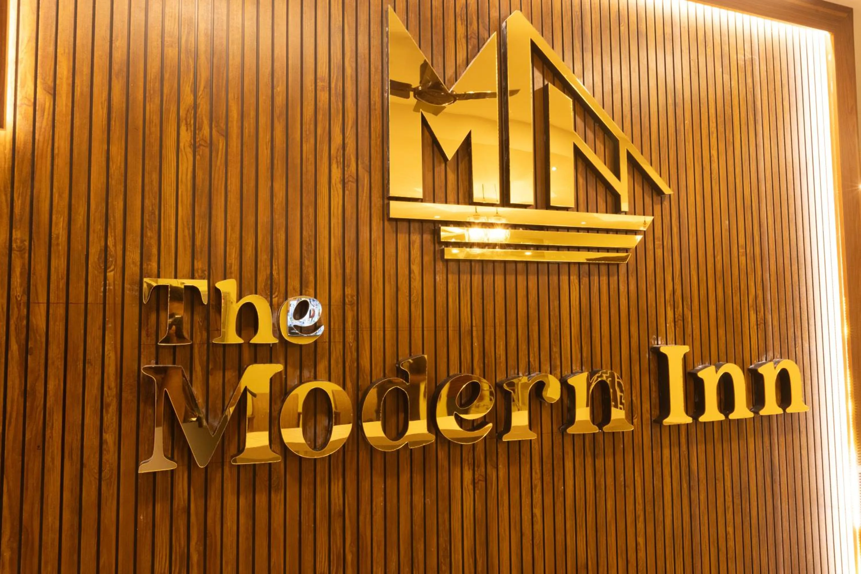 Property logo or sign in The Modern Inn