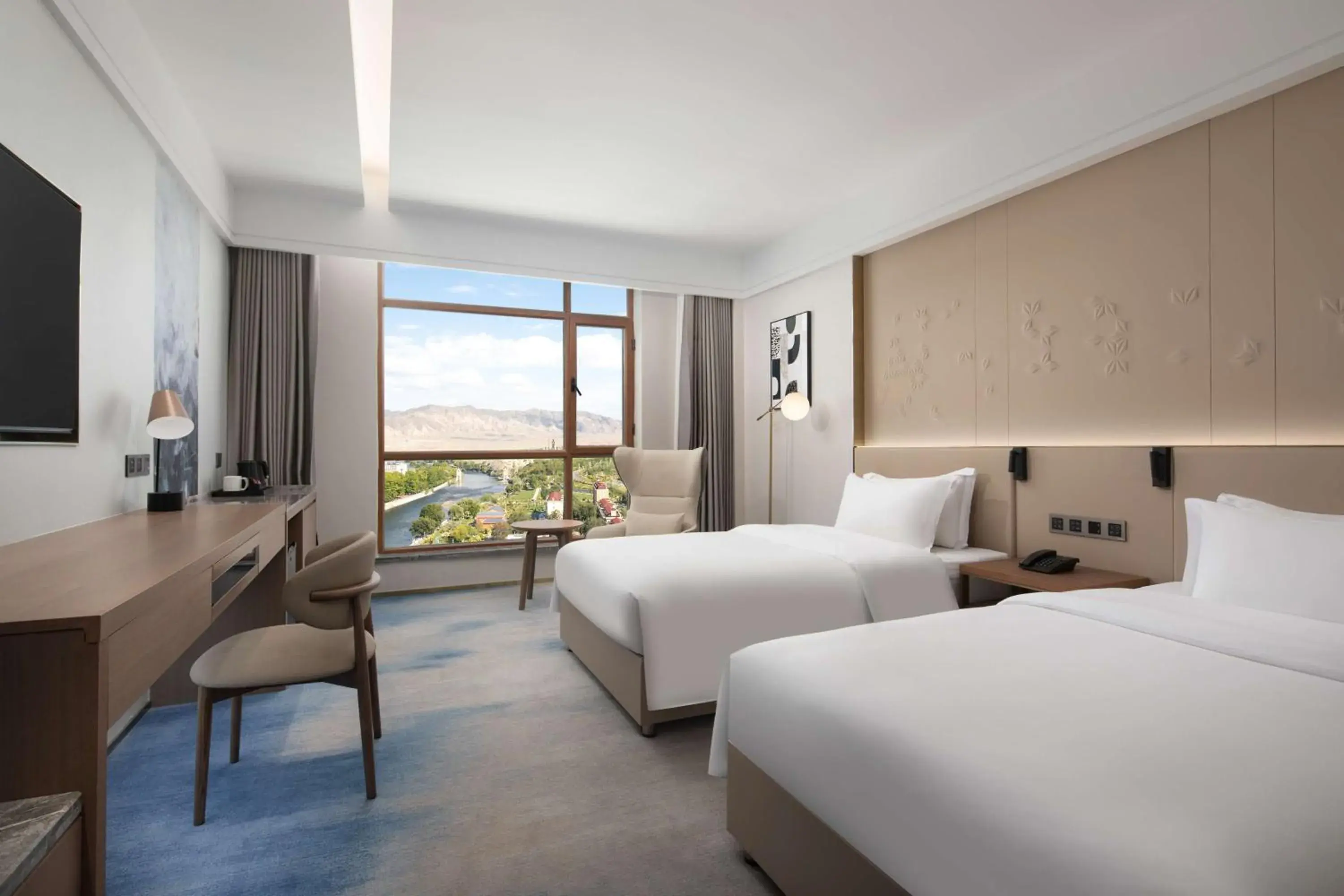 Twin Room with River View in Doubletree By Hilton Altay Fuyun Twin Room with River View in Doubletree By Hilton Altay Fuyun