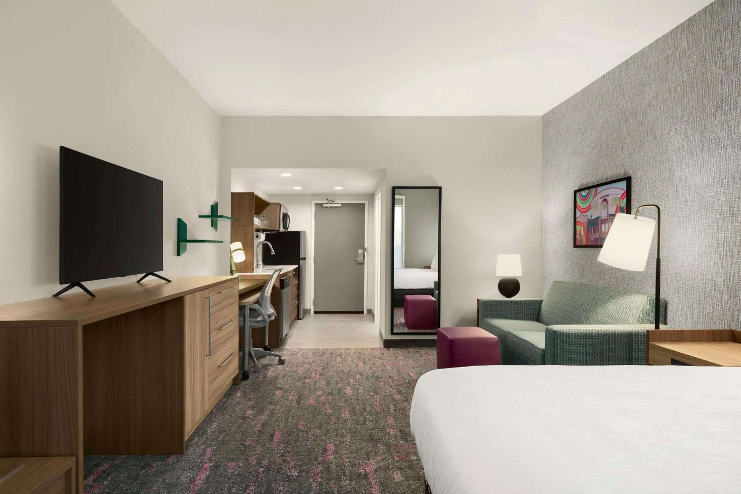 Living room, Bed in Home2 Suites By Hilton San Juan