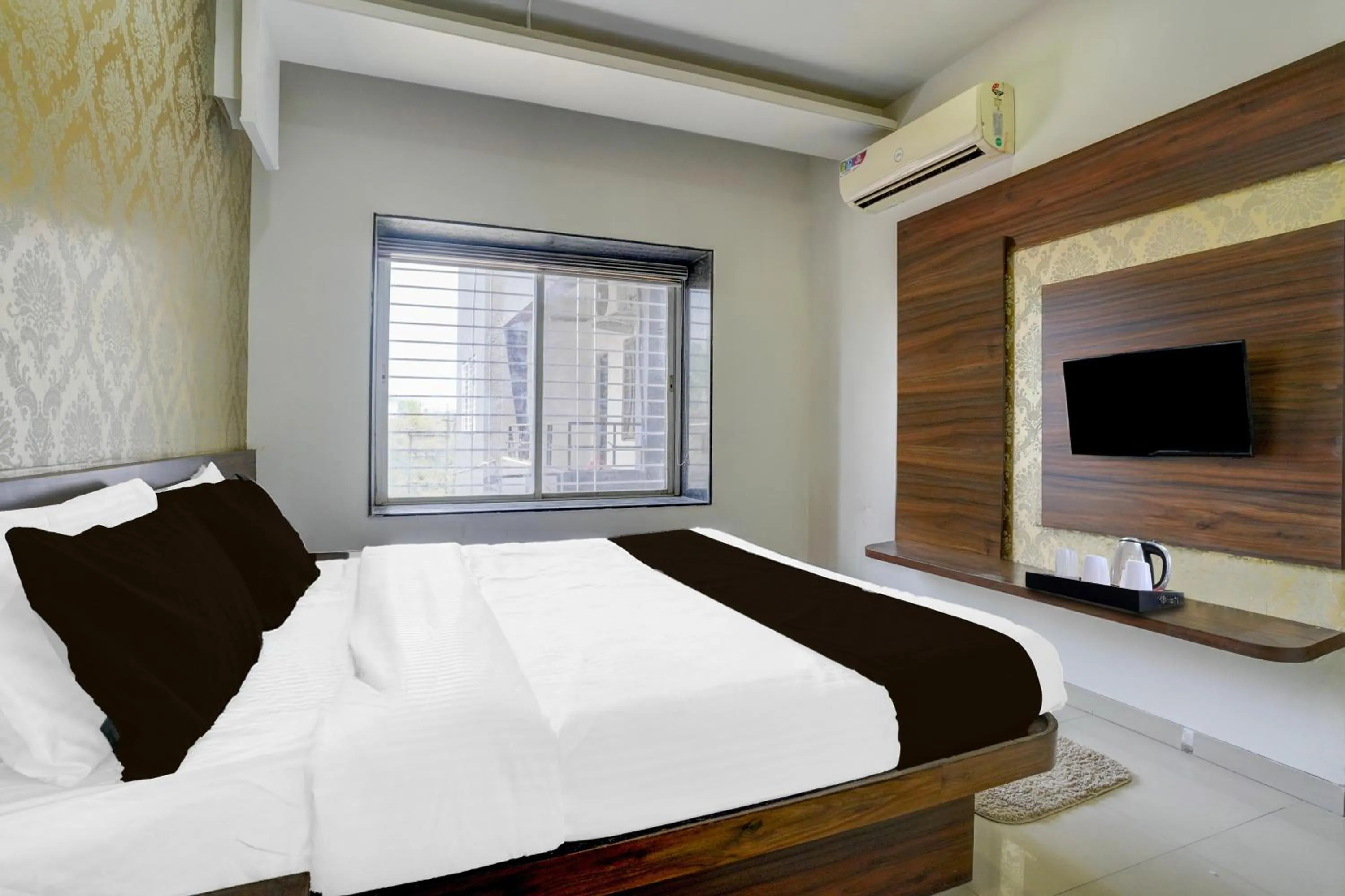 Bedroom, Bed in Townhouse Godavari Riverbank Formerly Shanti Datta Inn