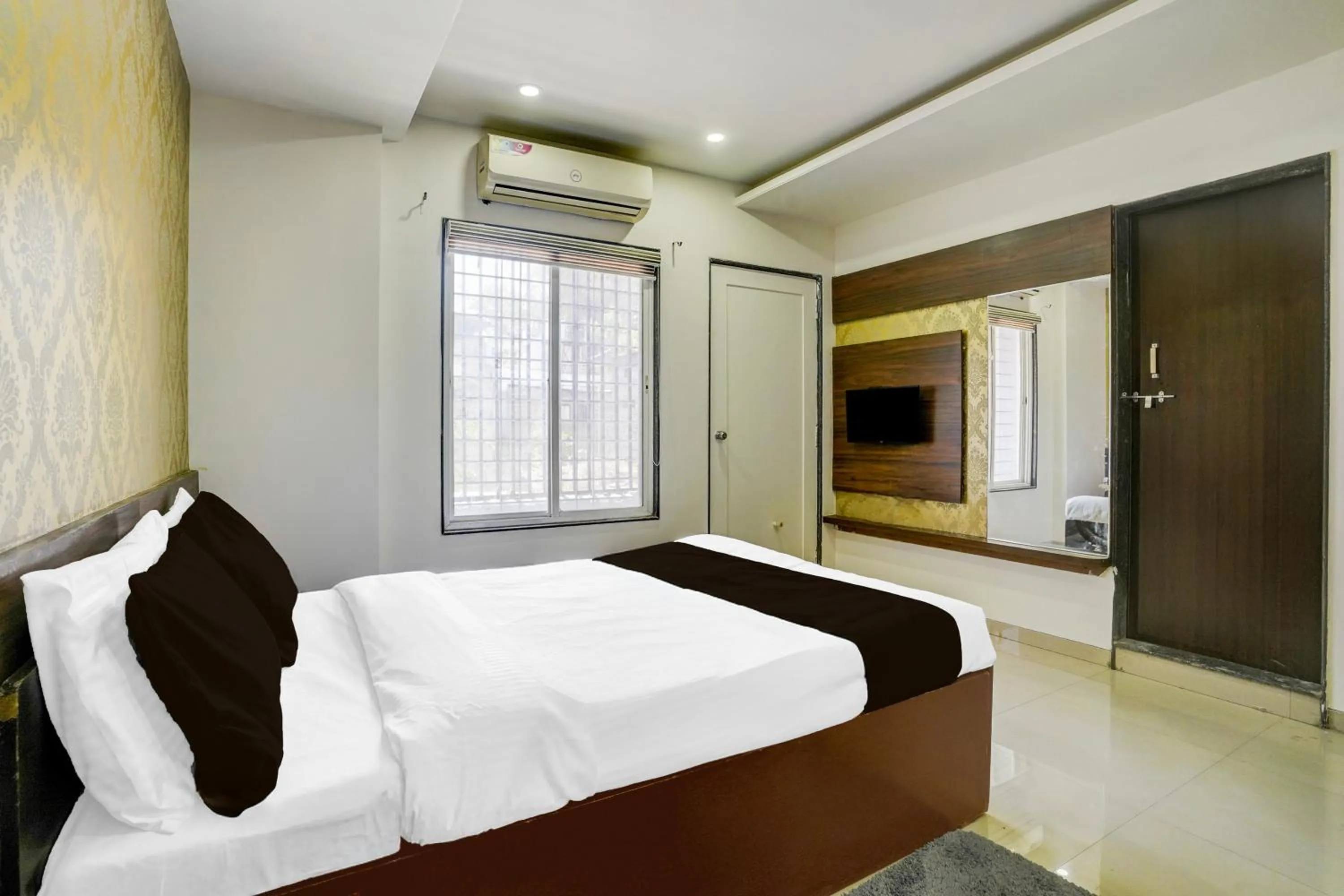 Bedroom, Bed in Townhouse Godavari Riverbank Formerly Shanti Datta Inn