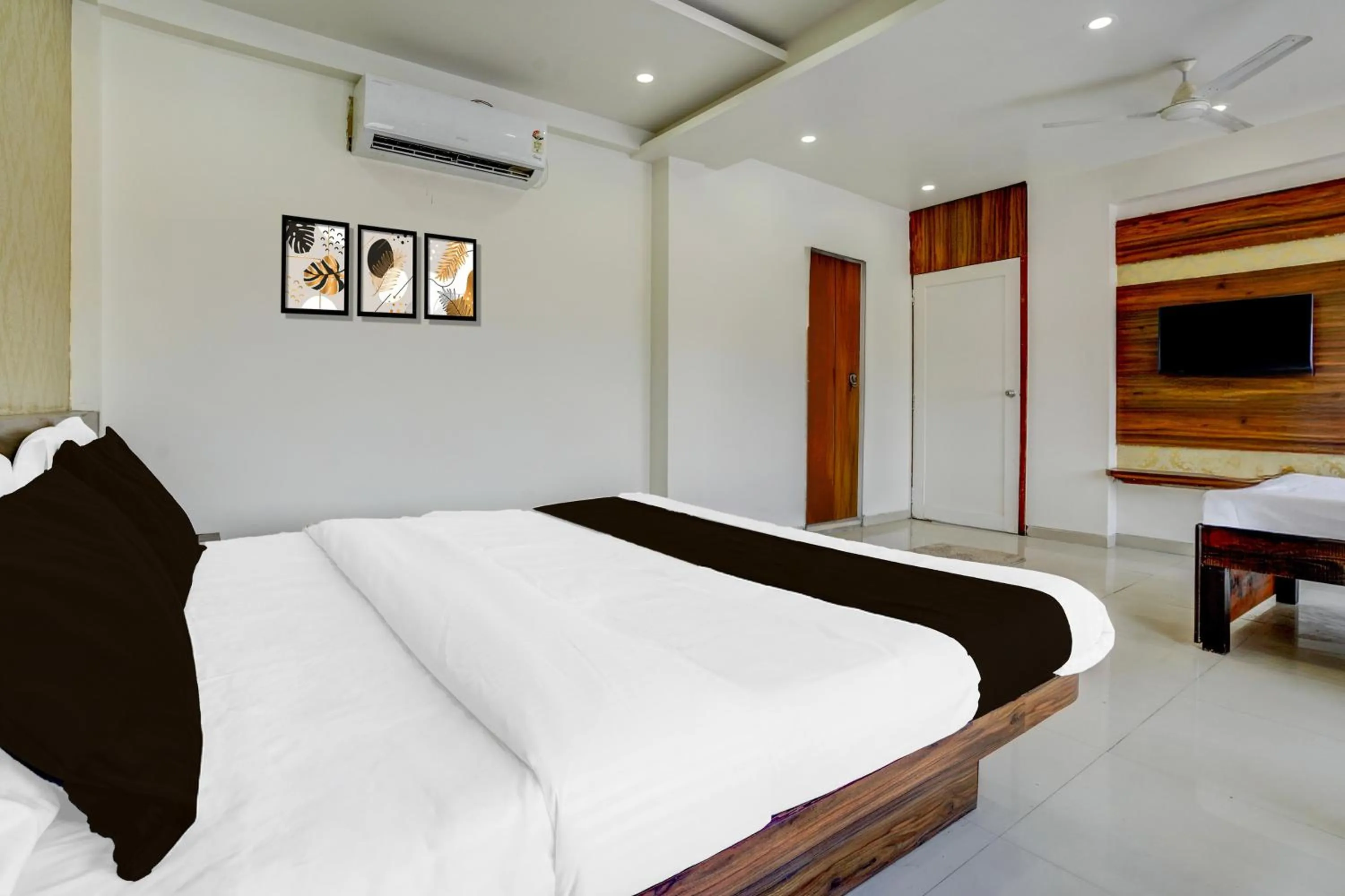 Bedroom, Bed in Townhouse Godavari Riverbank Formerly Shanti Datta Inn