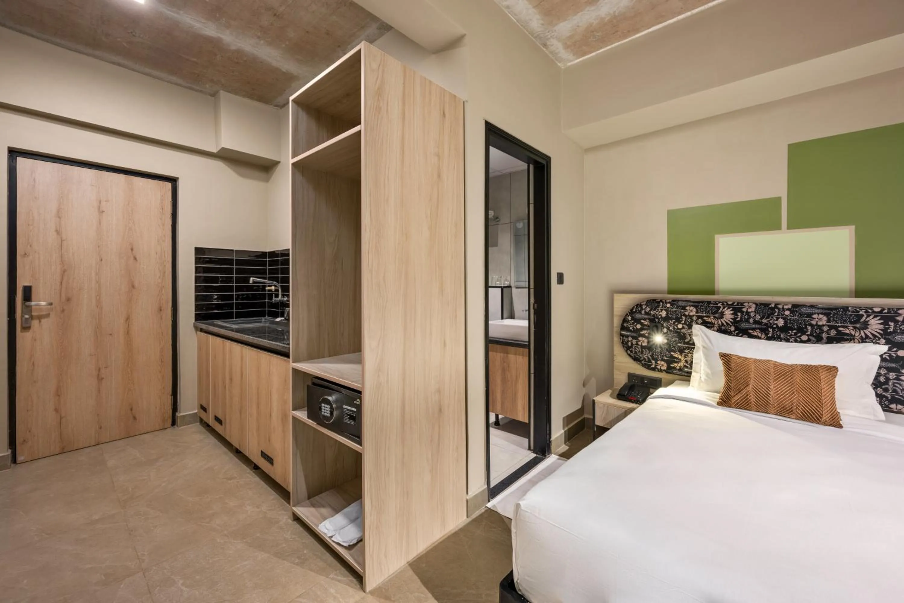 Kitchen or kitchenette, Bed in Grand Continent Koramangala, Bangalore