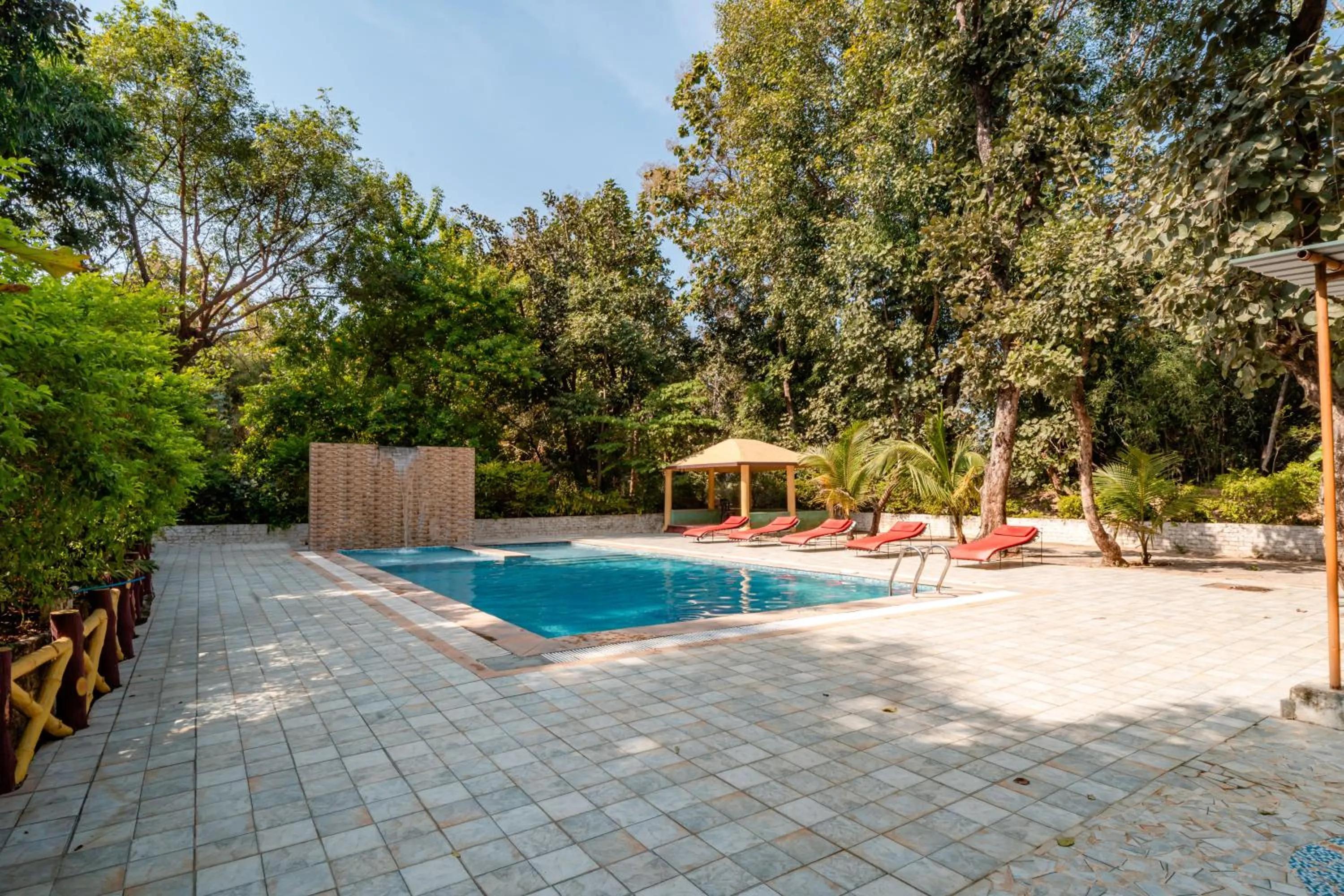 Swimming pool in Treebo Premium Mowgli's Den, Pench
