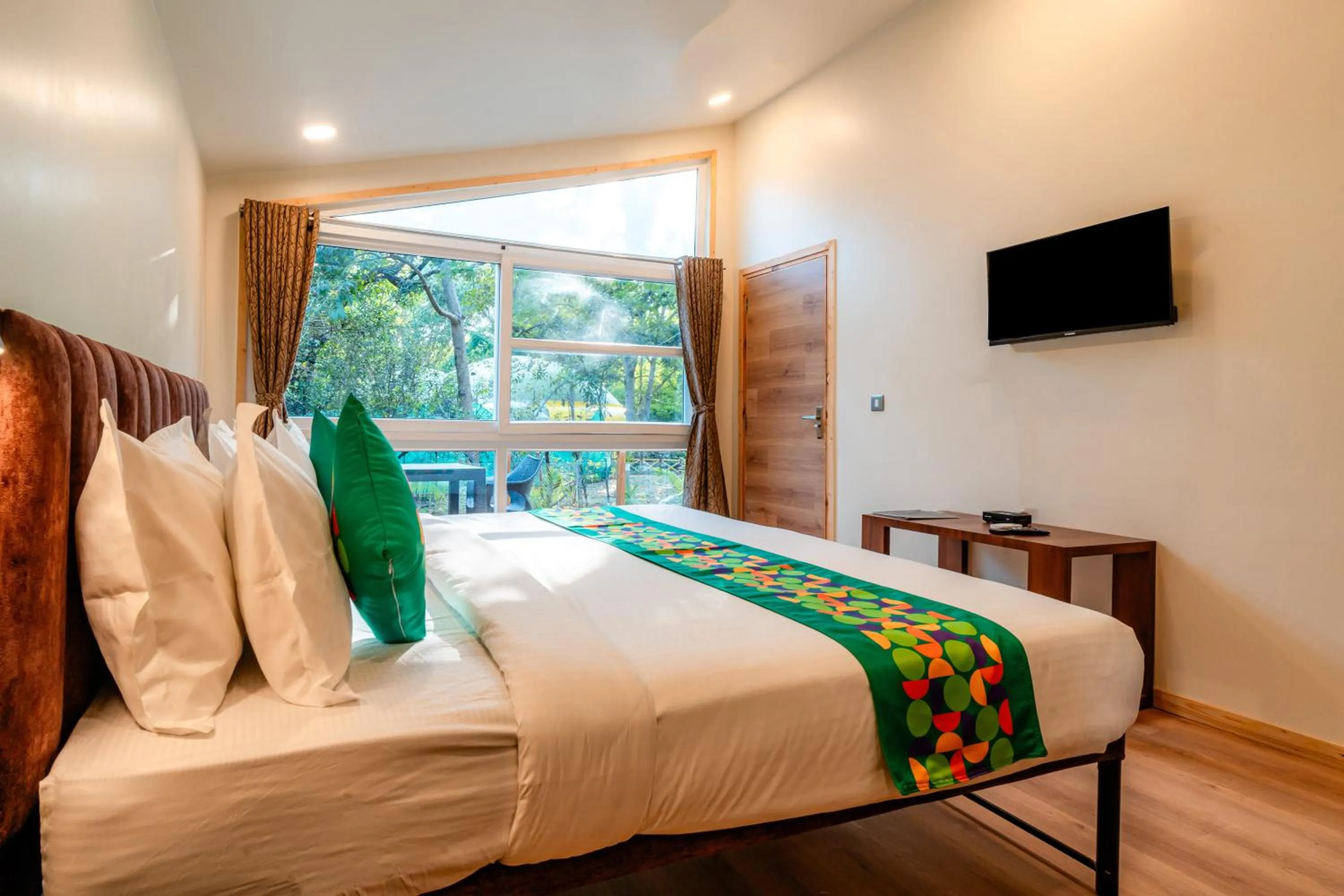 Bedroom, Bed in Treebo Premium Mowgli's Den, Pench