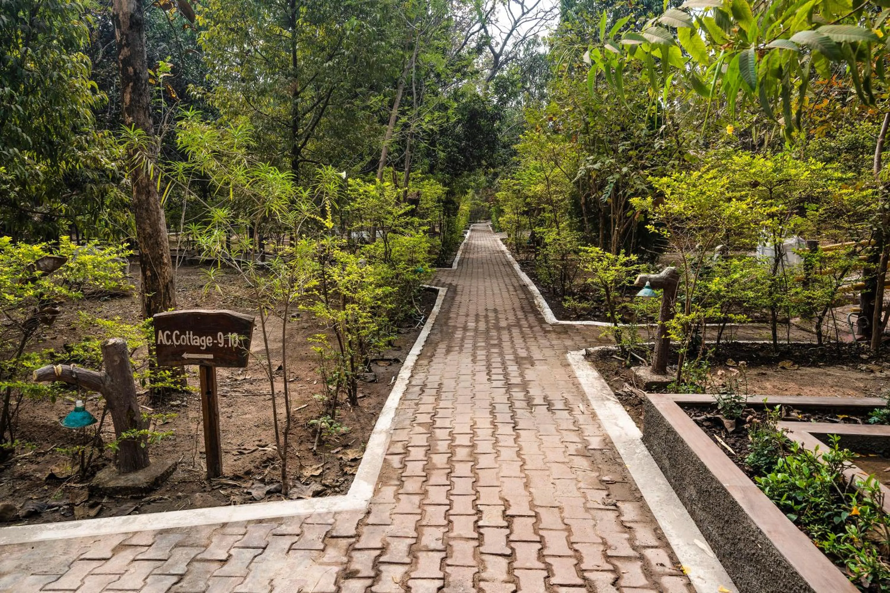 Garden in Treebo Premium Mowgli's Den Pench with Swimming Pool