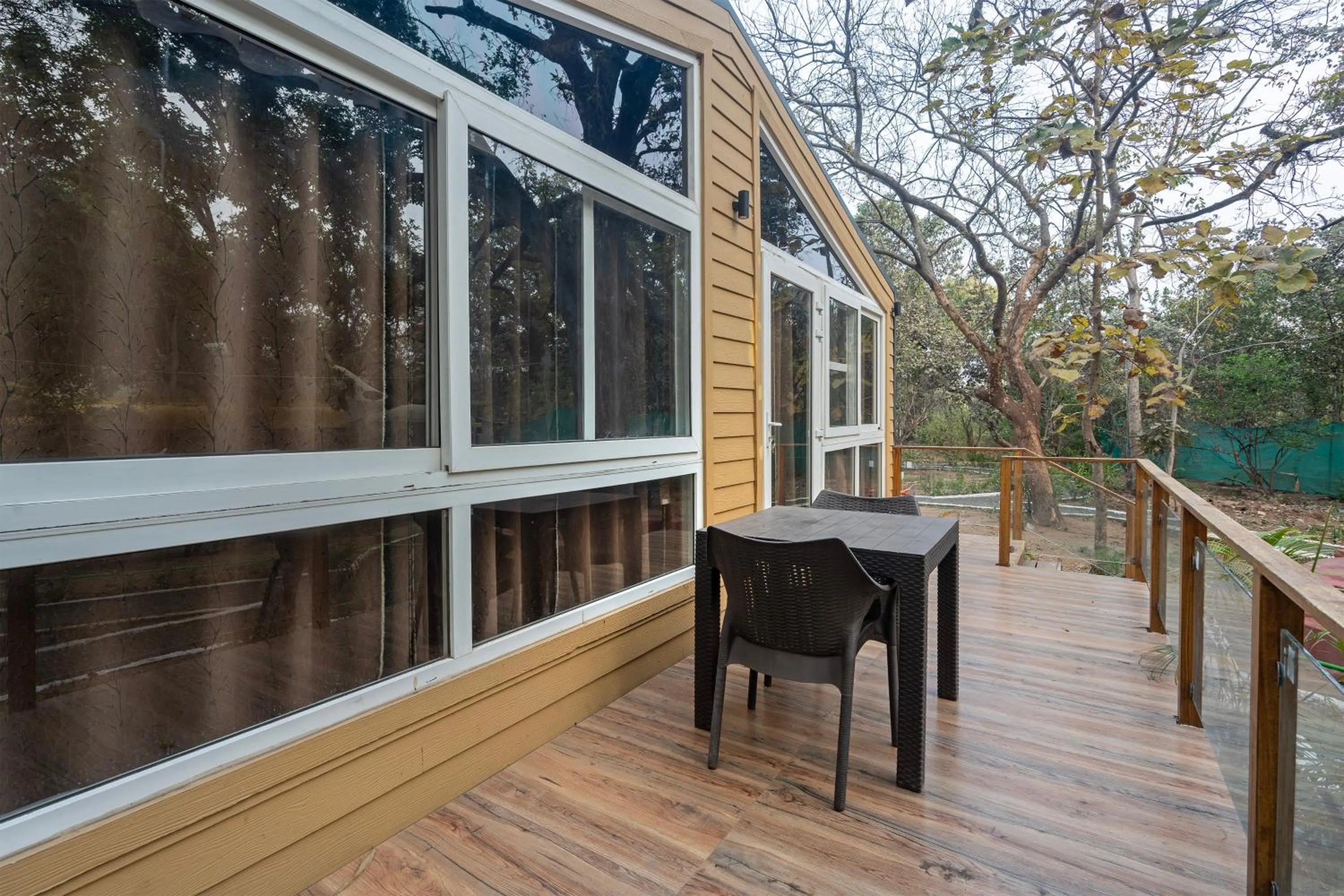 Seating area in Treebo Premium Mowgli's Den Pench with Swimming Pool