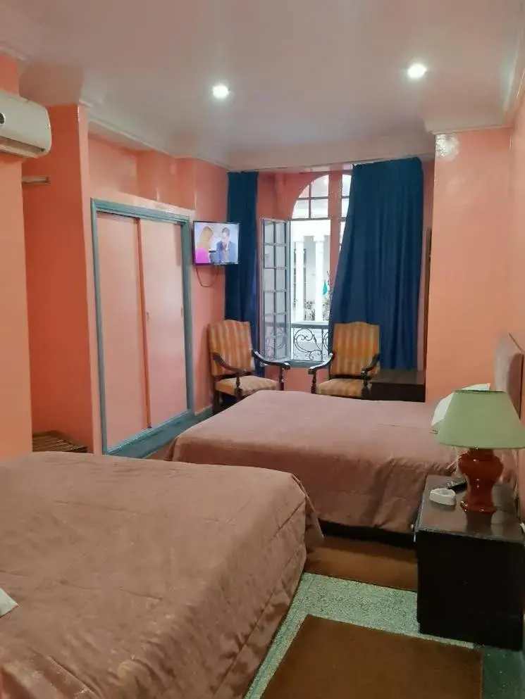 Triple Room in Hôtel Volubilis Triple Room in Hôtel Volubilis