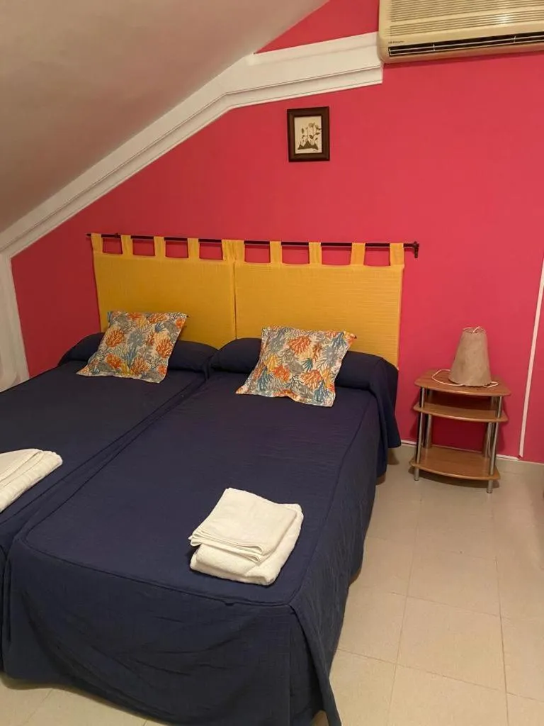 Bedroom, Bed in Hostal y Apartamentos la Vereda