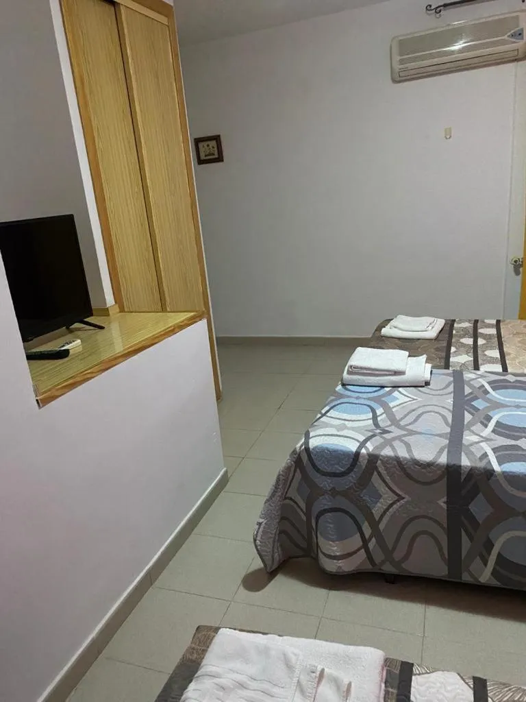 Bedroom, Bed in Hostal y Apartamentos la Vereda