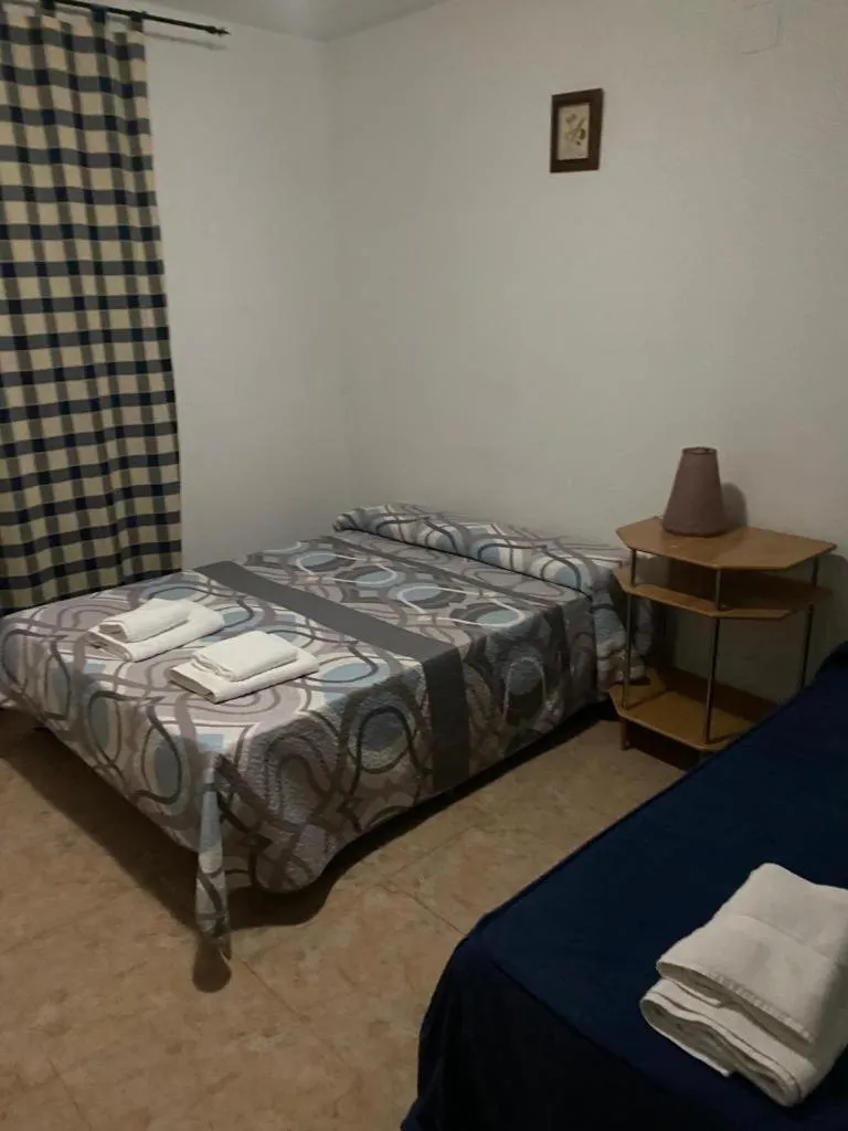 Bedroom, Bed in Hostal y Apartamentos la Vereda