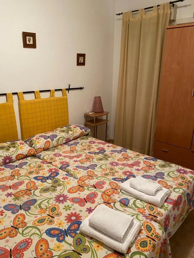 Bedroom, Bed in Hostal y Apartamentos la Vereda