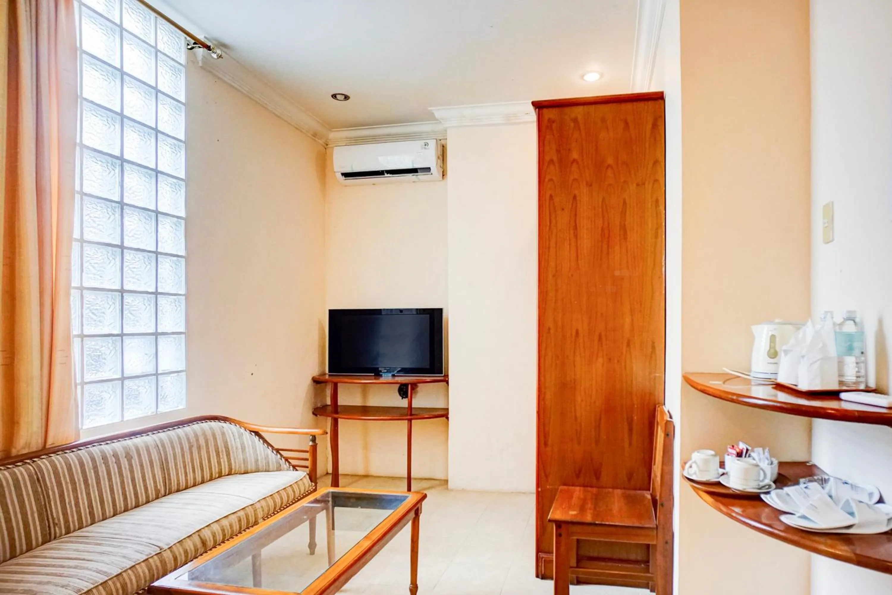 Bedroom in Collection O Peunayong Near Masjid Raya Baiturrahman Formerly Siwah Hotel