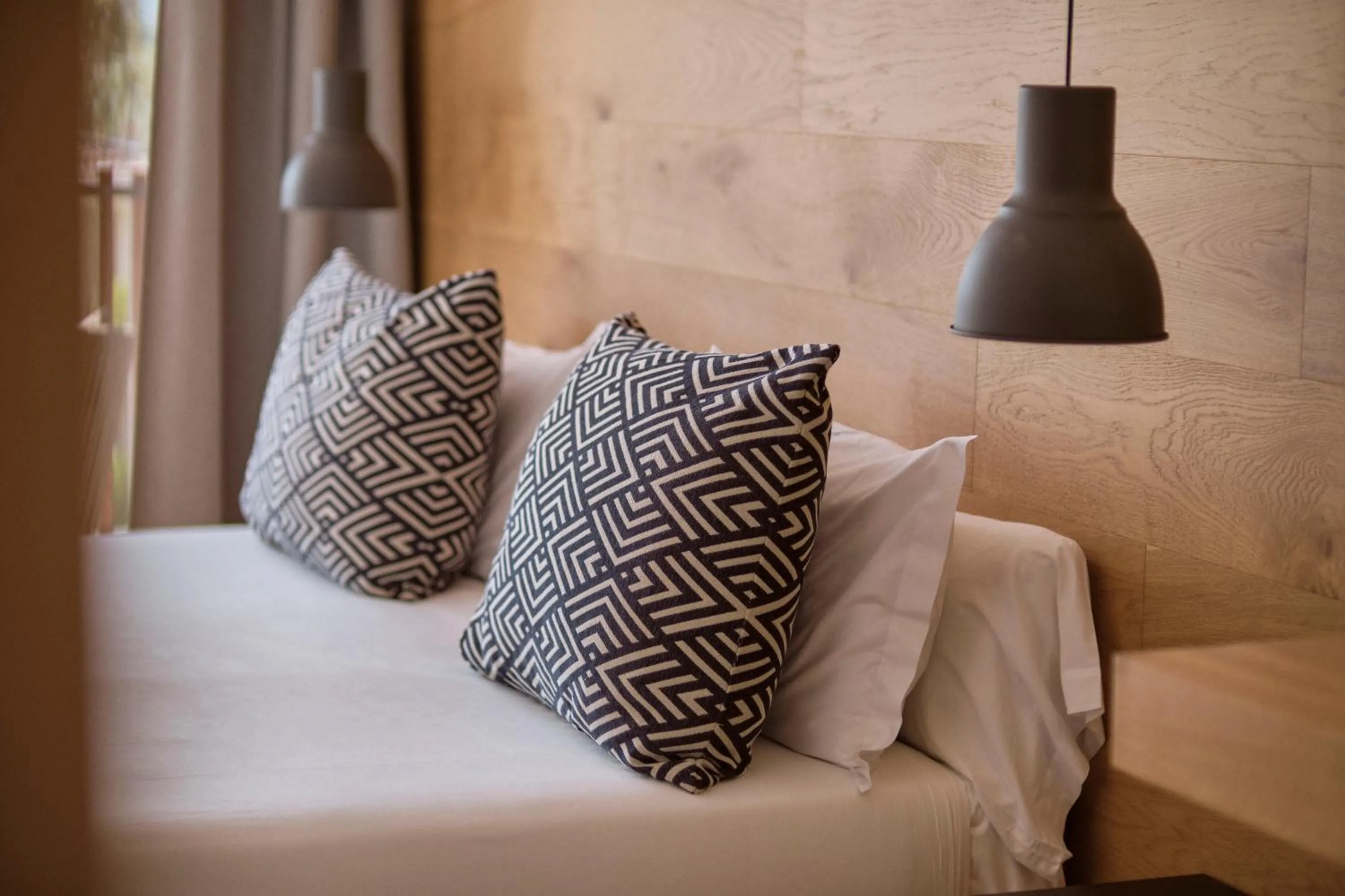 Bed in Las Gaviotas Suites Hotel & Spa