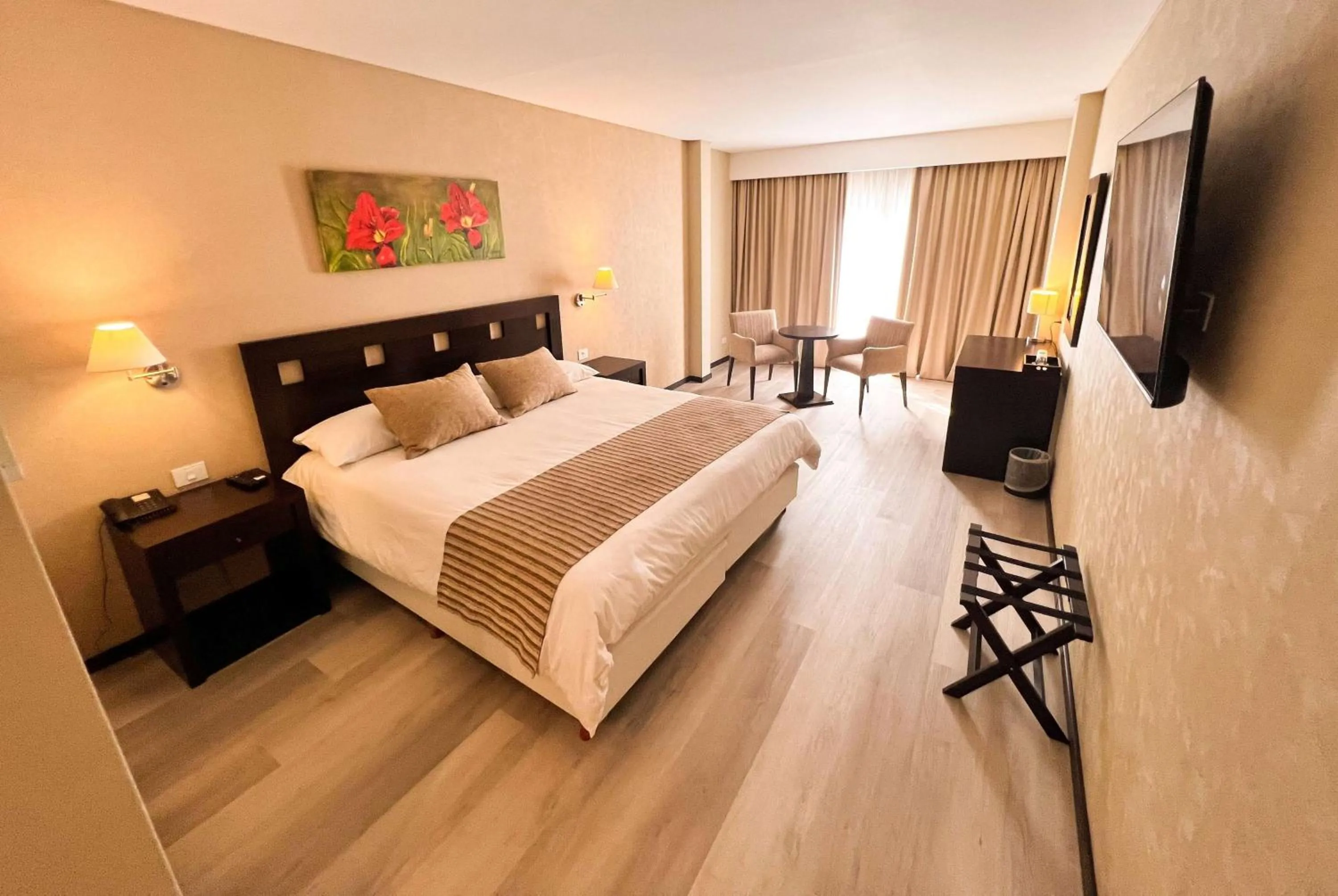 Photo of the whole room, Bed in Howard Johnson Hotel & Resort Funes