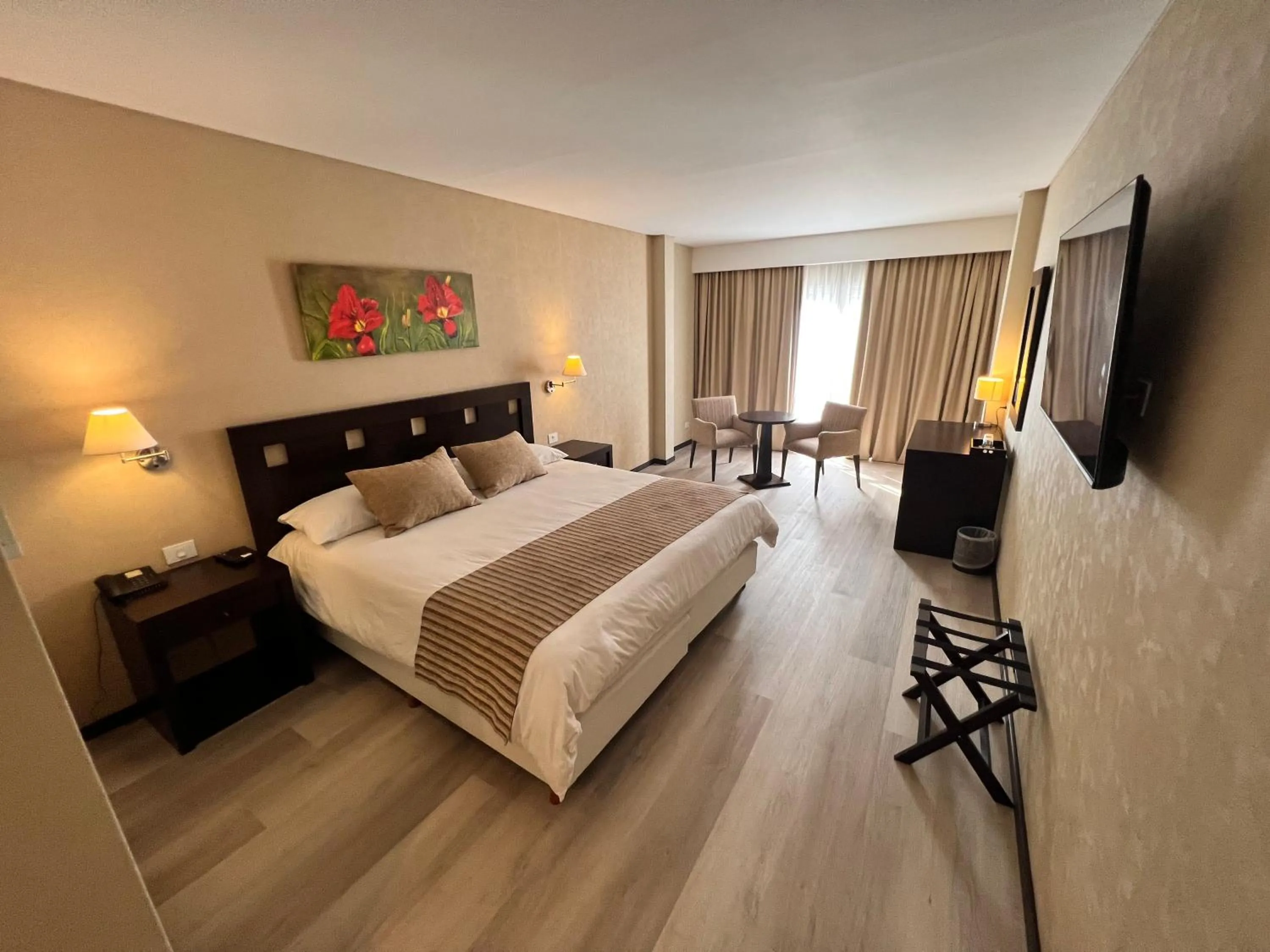 Bed in Howard Johnson Hotel & Resort Funes