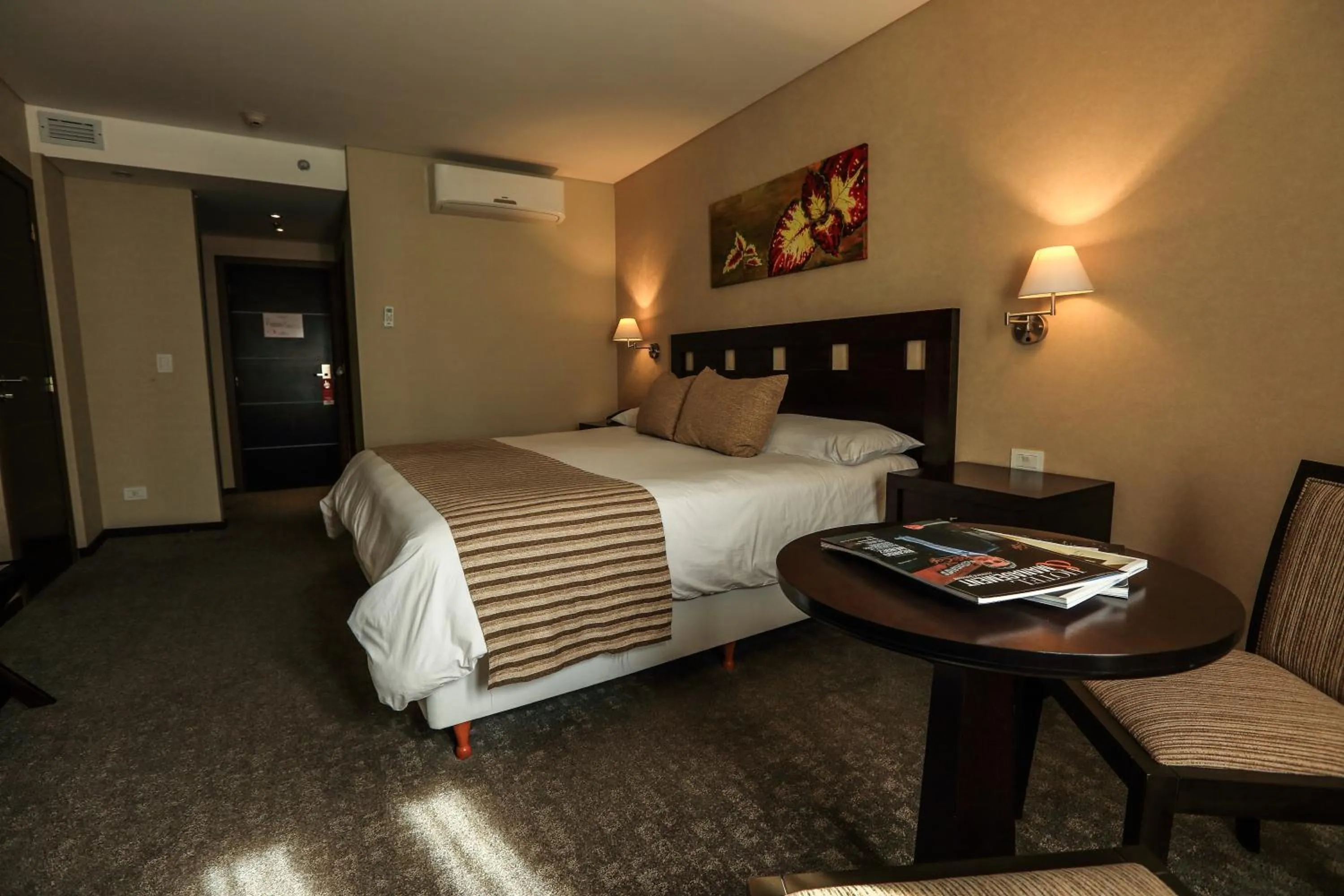 Bed in Howard Johnson Hotel & Resort Funes