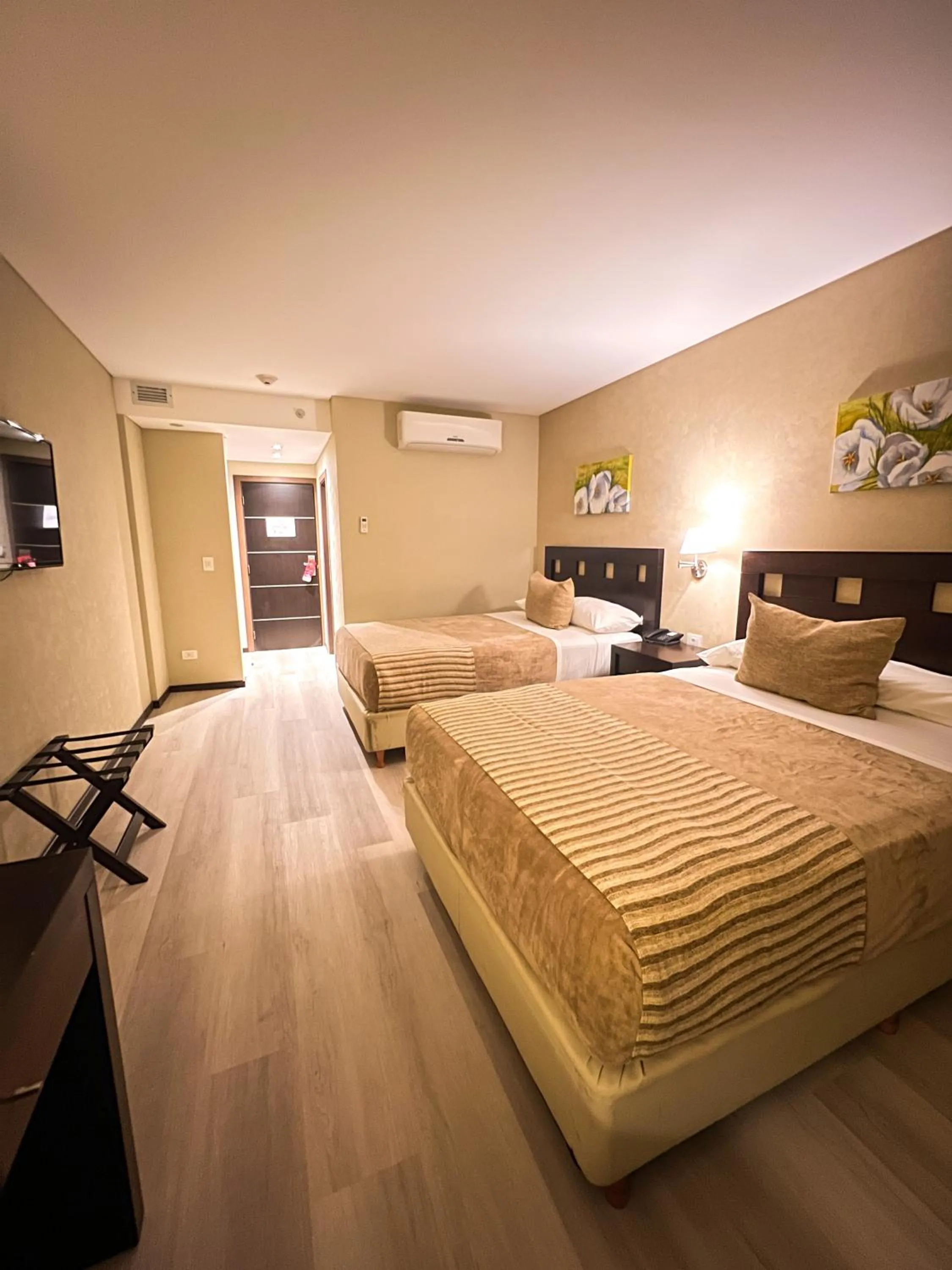 Bed in Howard Johnson Hotel & Resort Funes