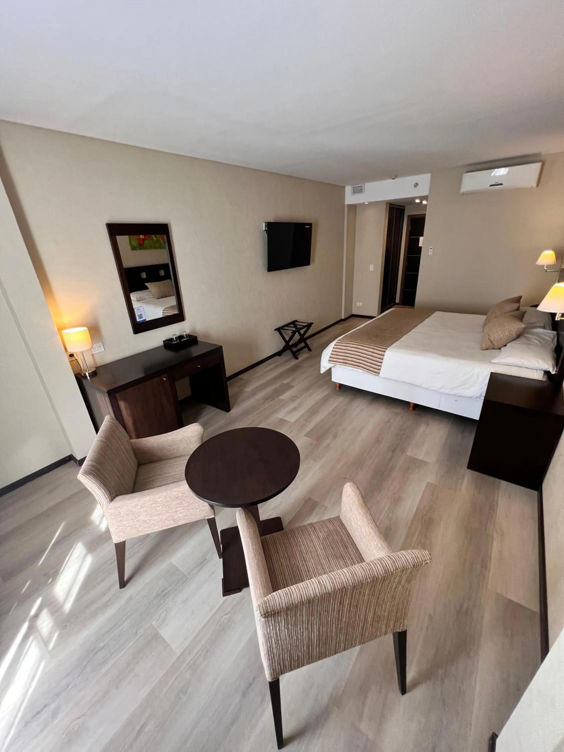 Bed in Howard Johnson Hotel & Resort Funes