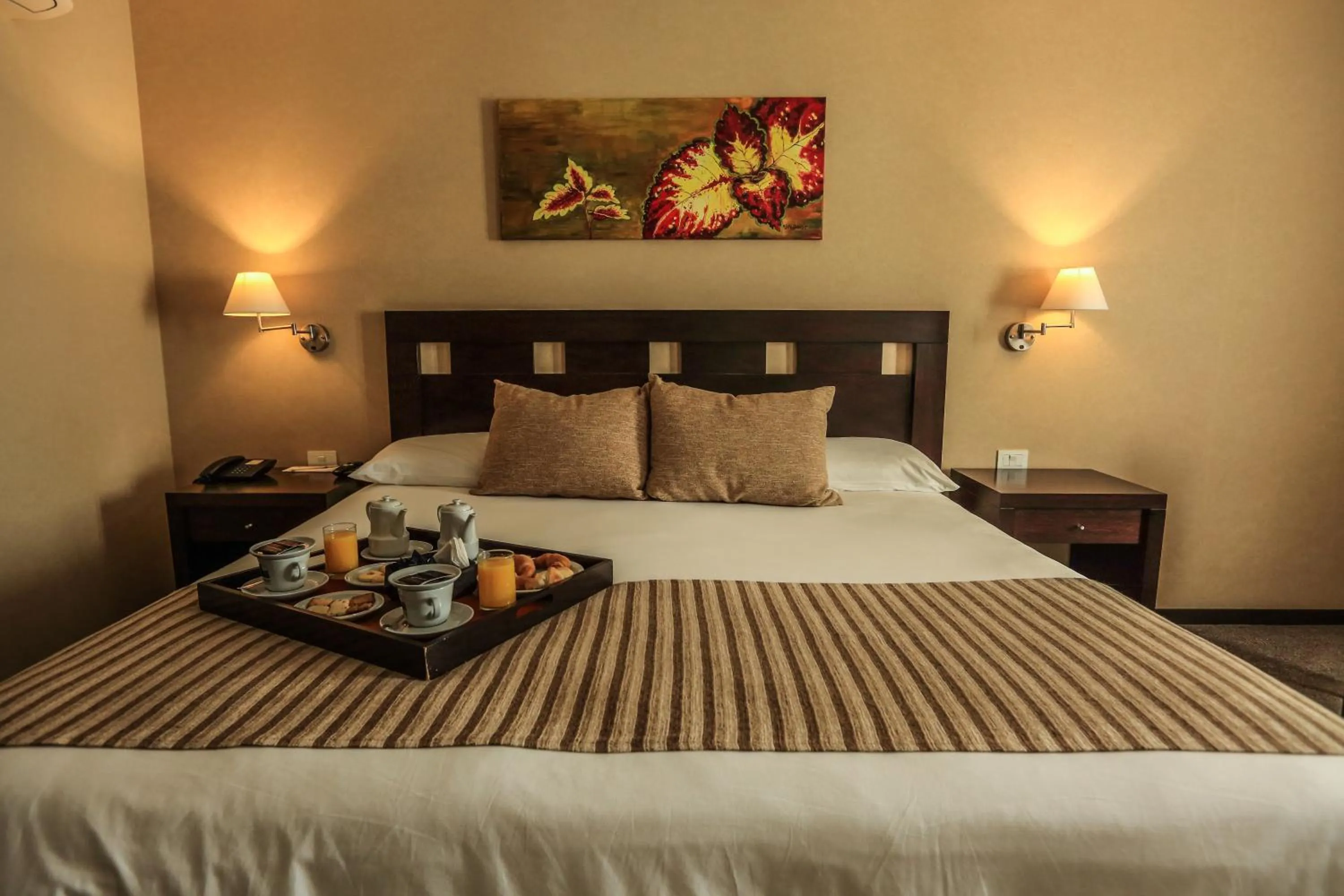 Bed in Howard Johnson Hotel & Resort Funes