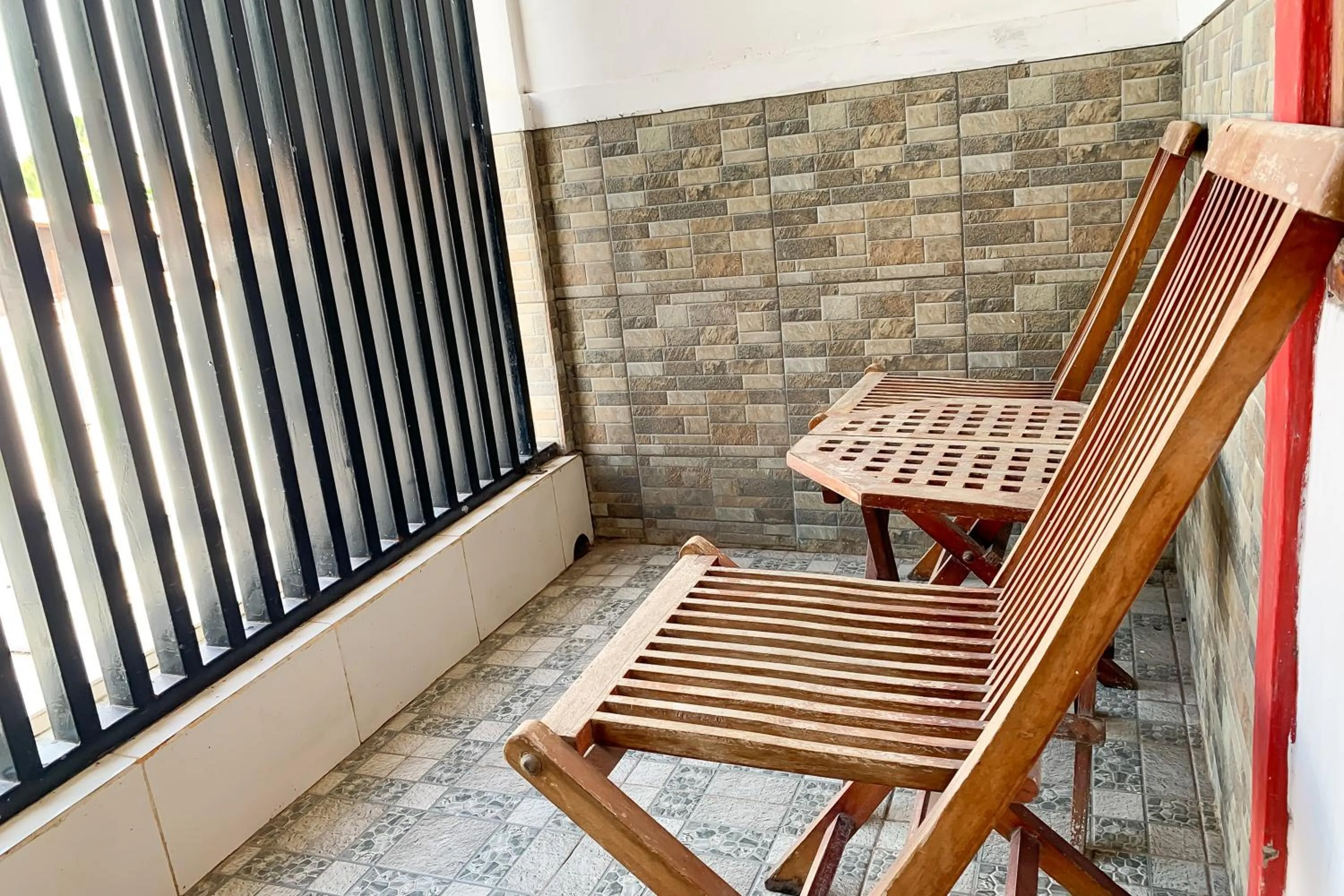 Seating area in Urbanview Hotel Permata Syariah Garut