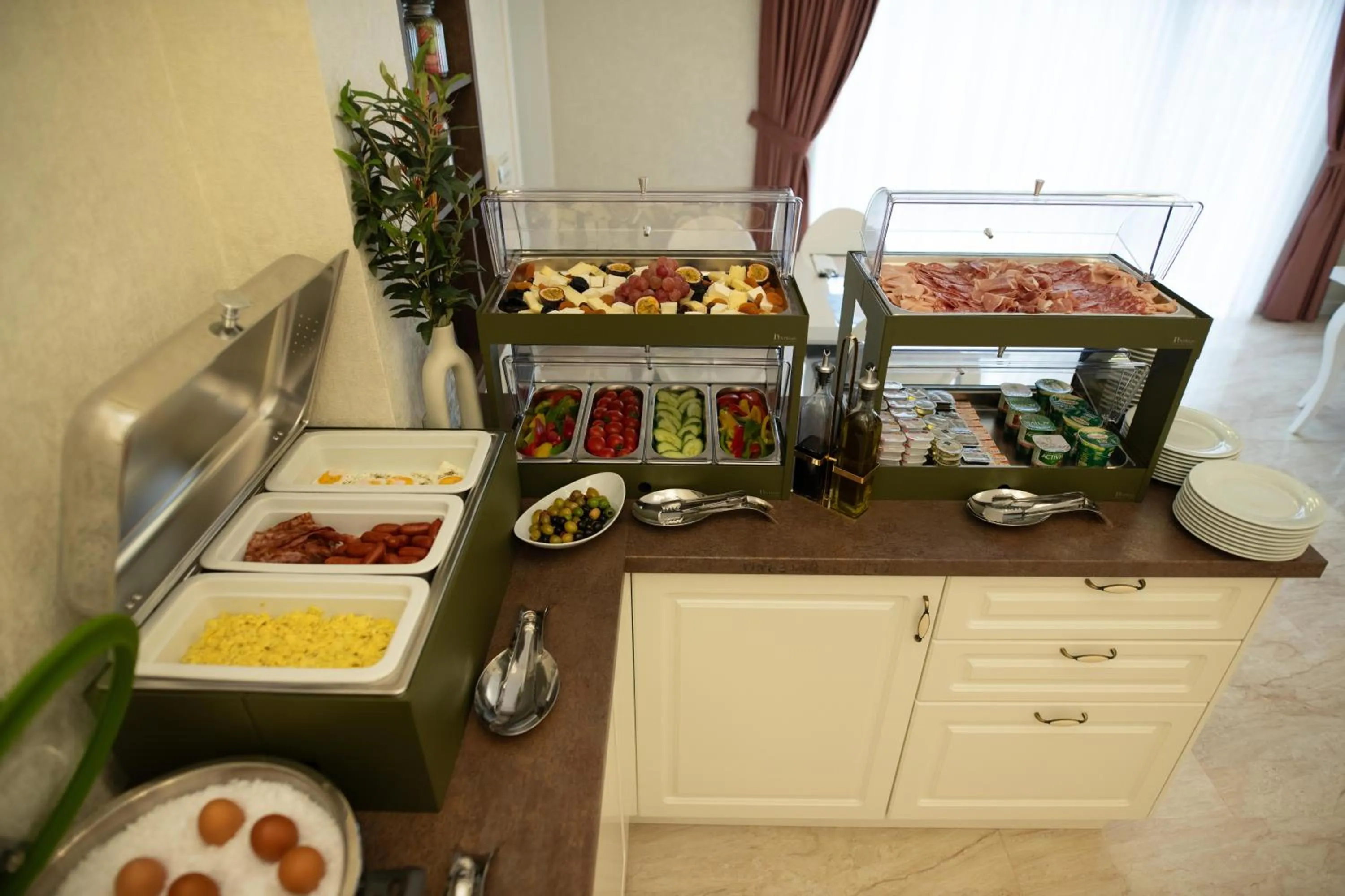 Buffet breakfast in Olivia 9teen Hotel Boutique