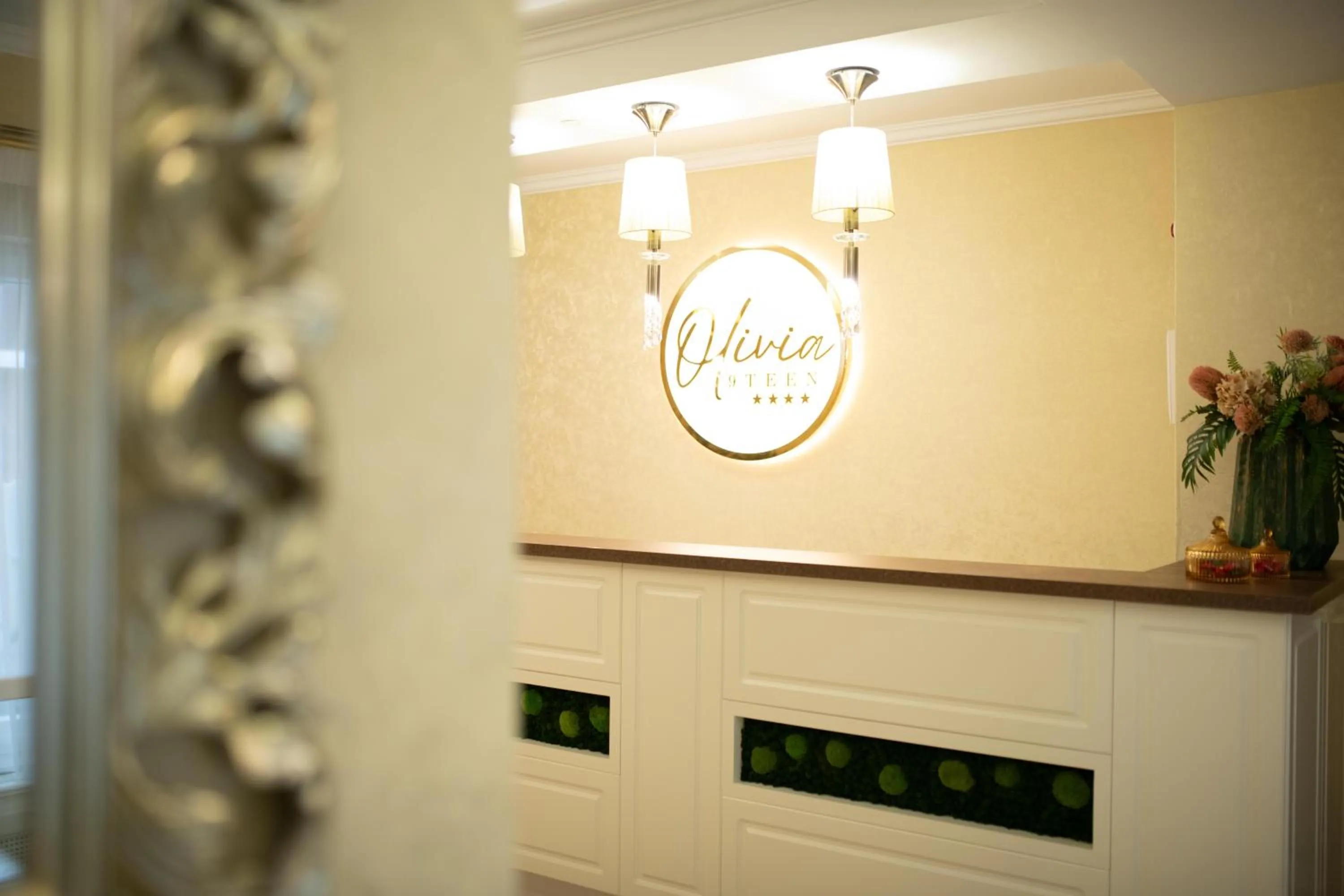 Property logo or sign in Olivia 9teen Hotel Boutique