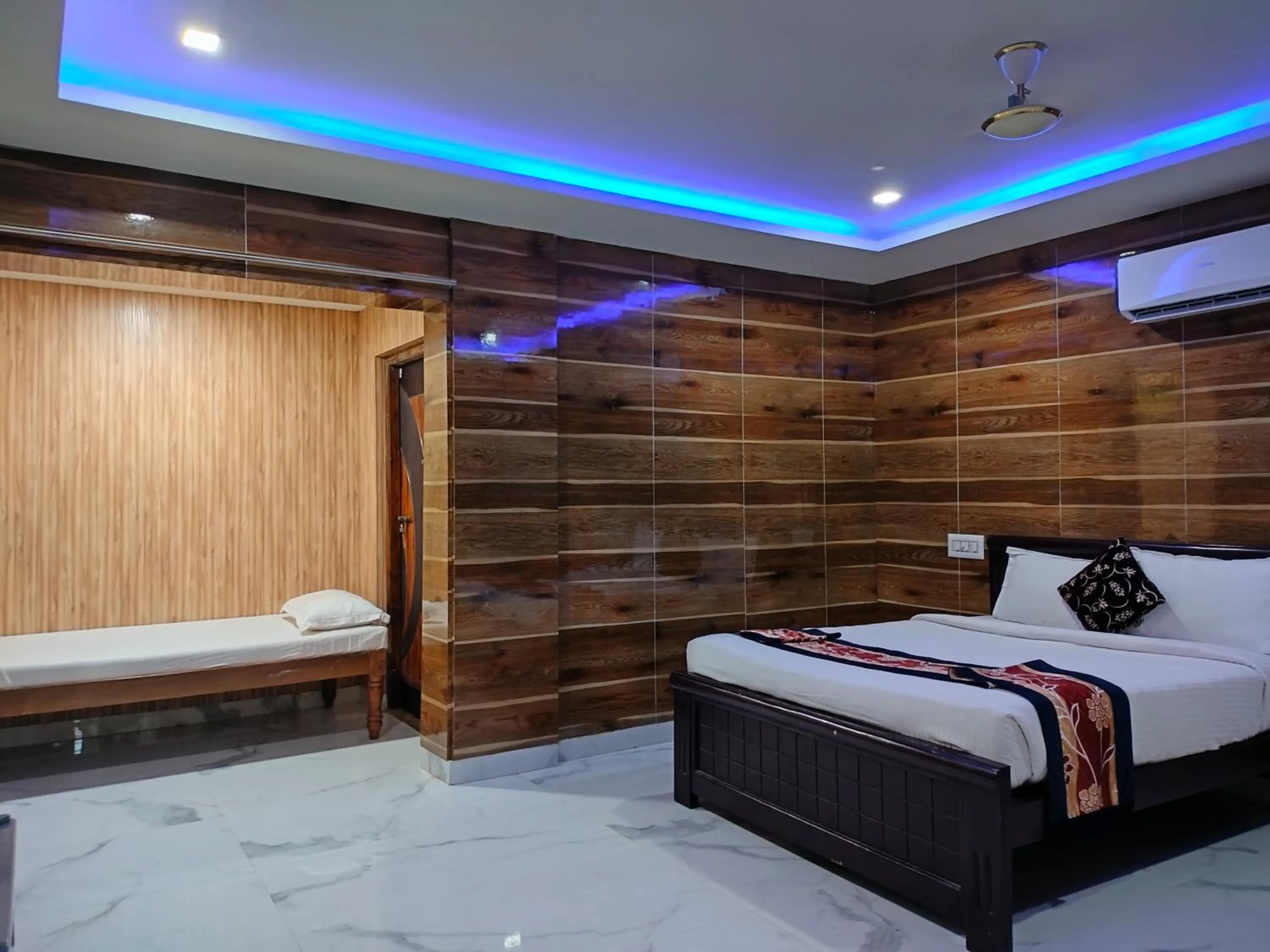 Bed in Thavika O Nila Resort & Convention Centre