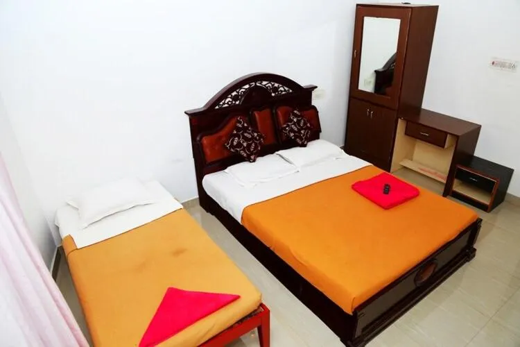 Bed in Thavika O Nila Resort & Convention Centre