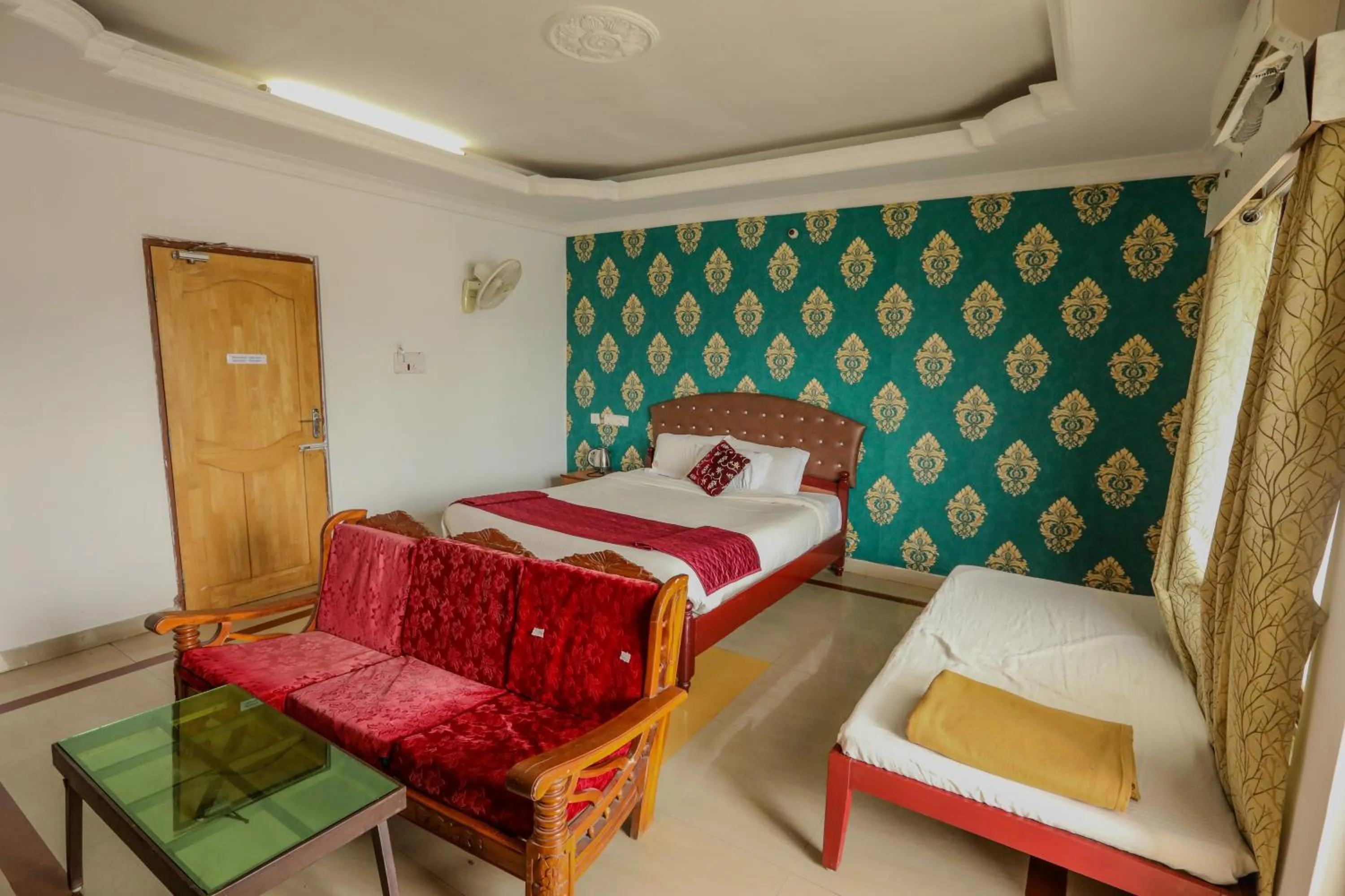 Bed in Thavika O Nila Resort & Convention Centre