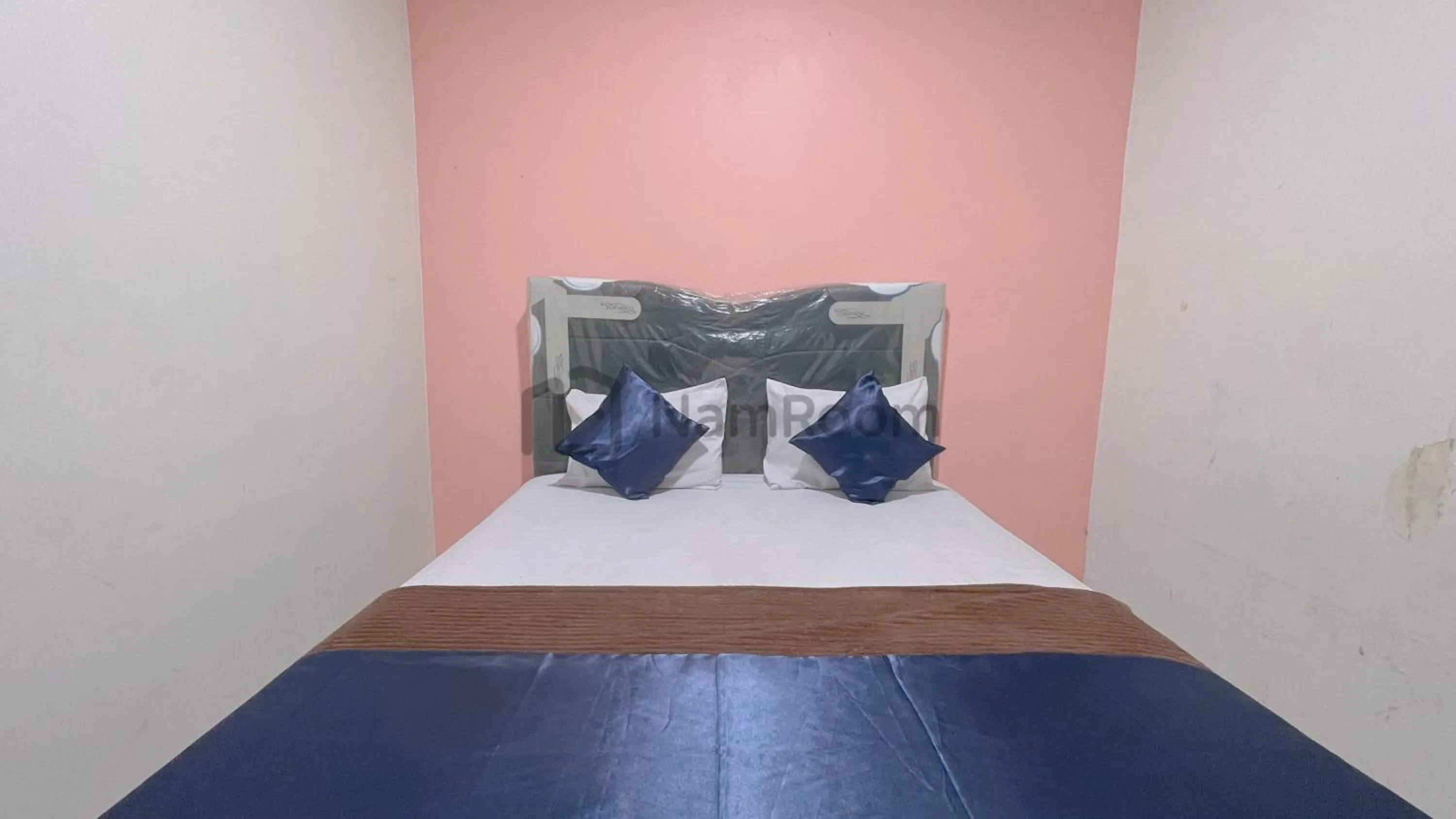 Bed in Cempaka Residence By NamRoom