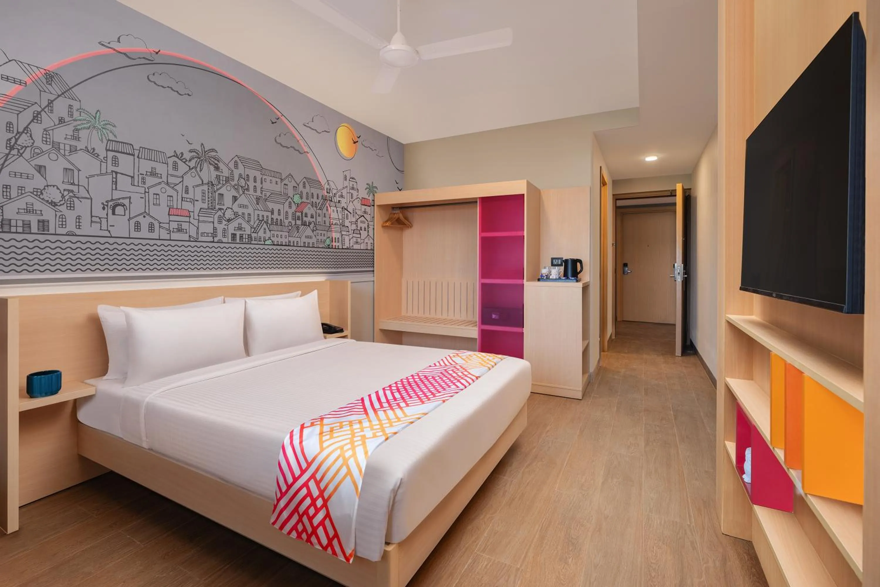 Communal lounge/ TV room, Bed in Ginger Goa Candolim