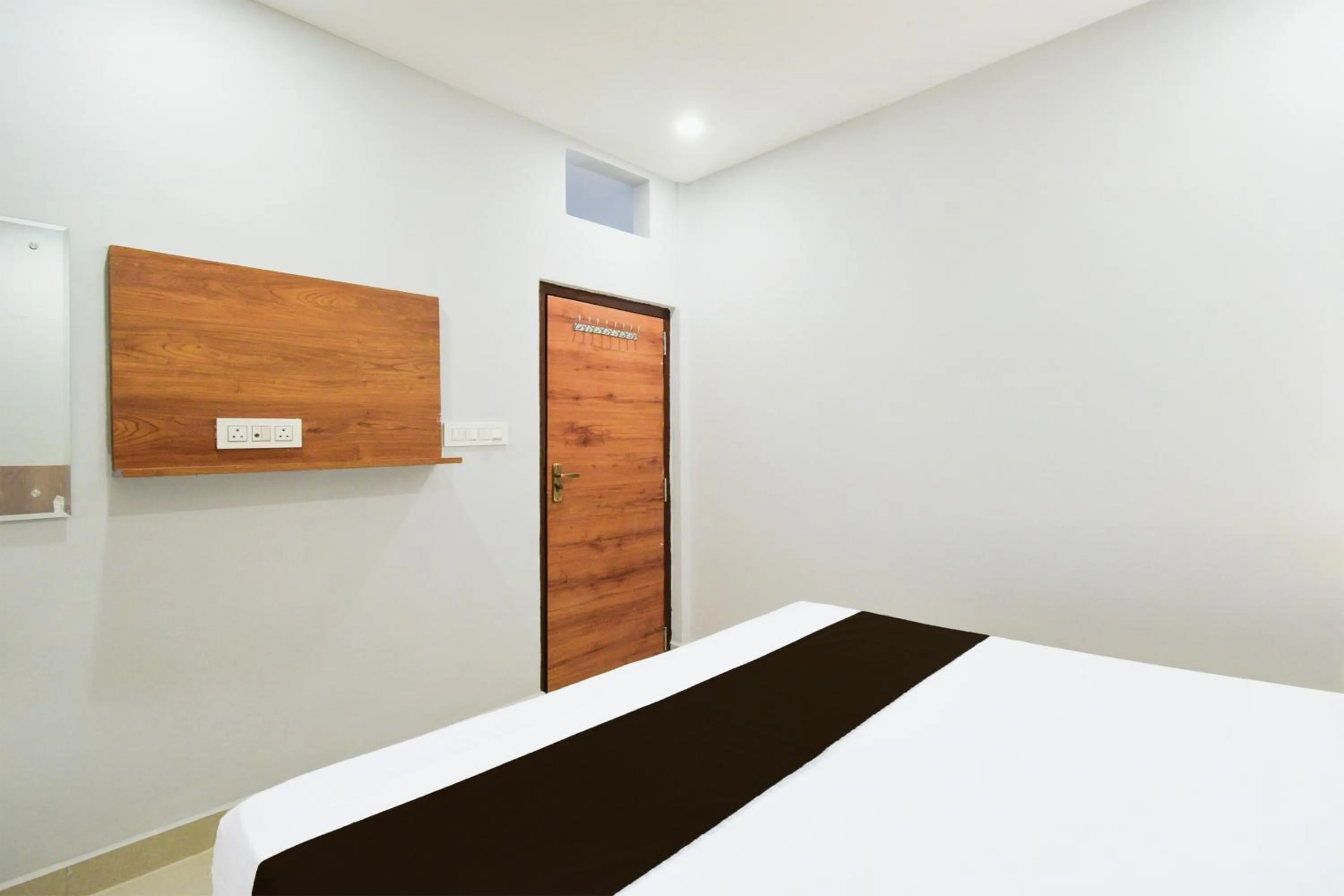 Bedroom, Bed in Hotel O Vaishnavi Residency