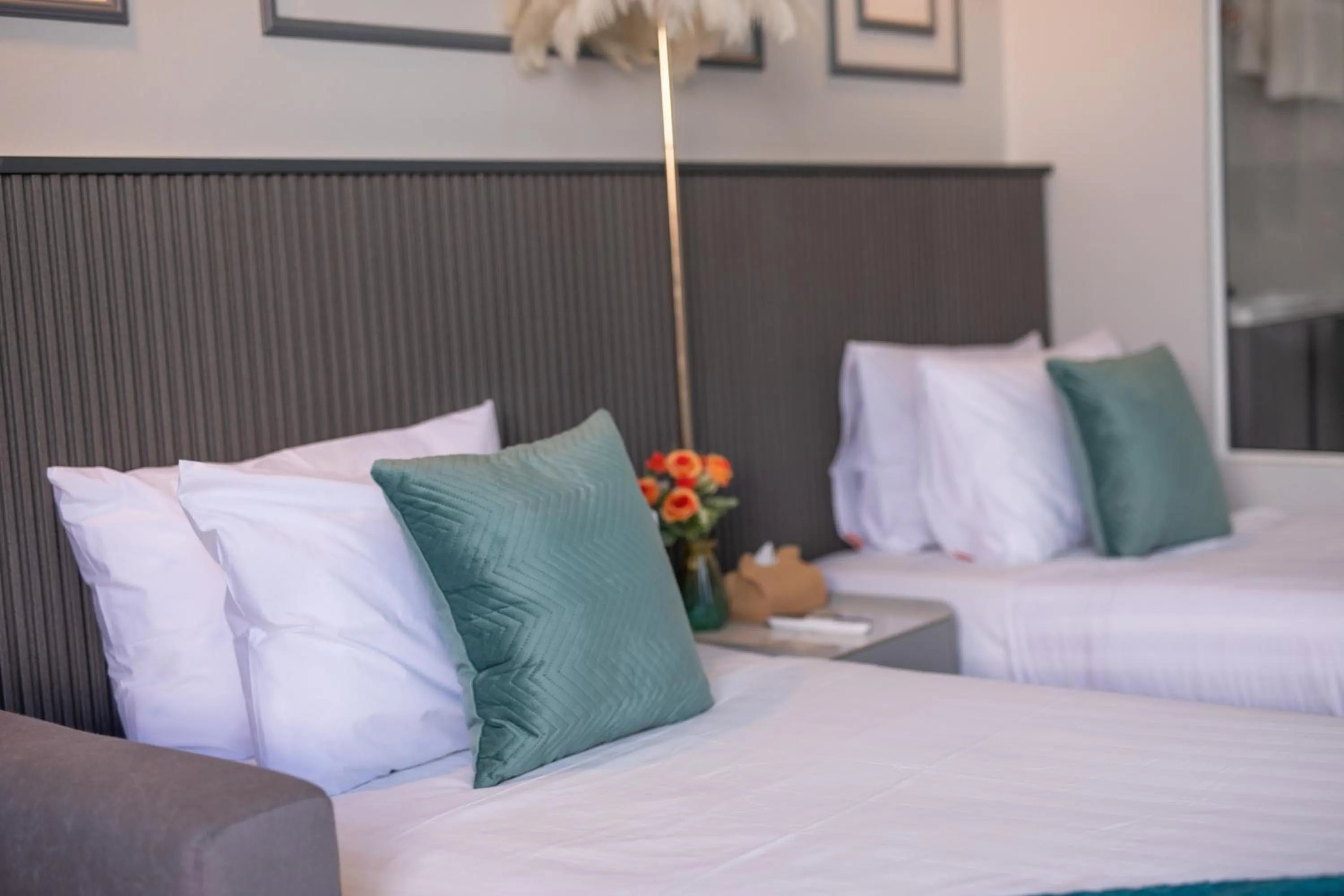 Bed in Best Time Pool Suites