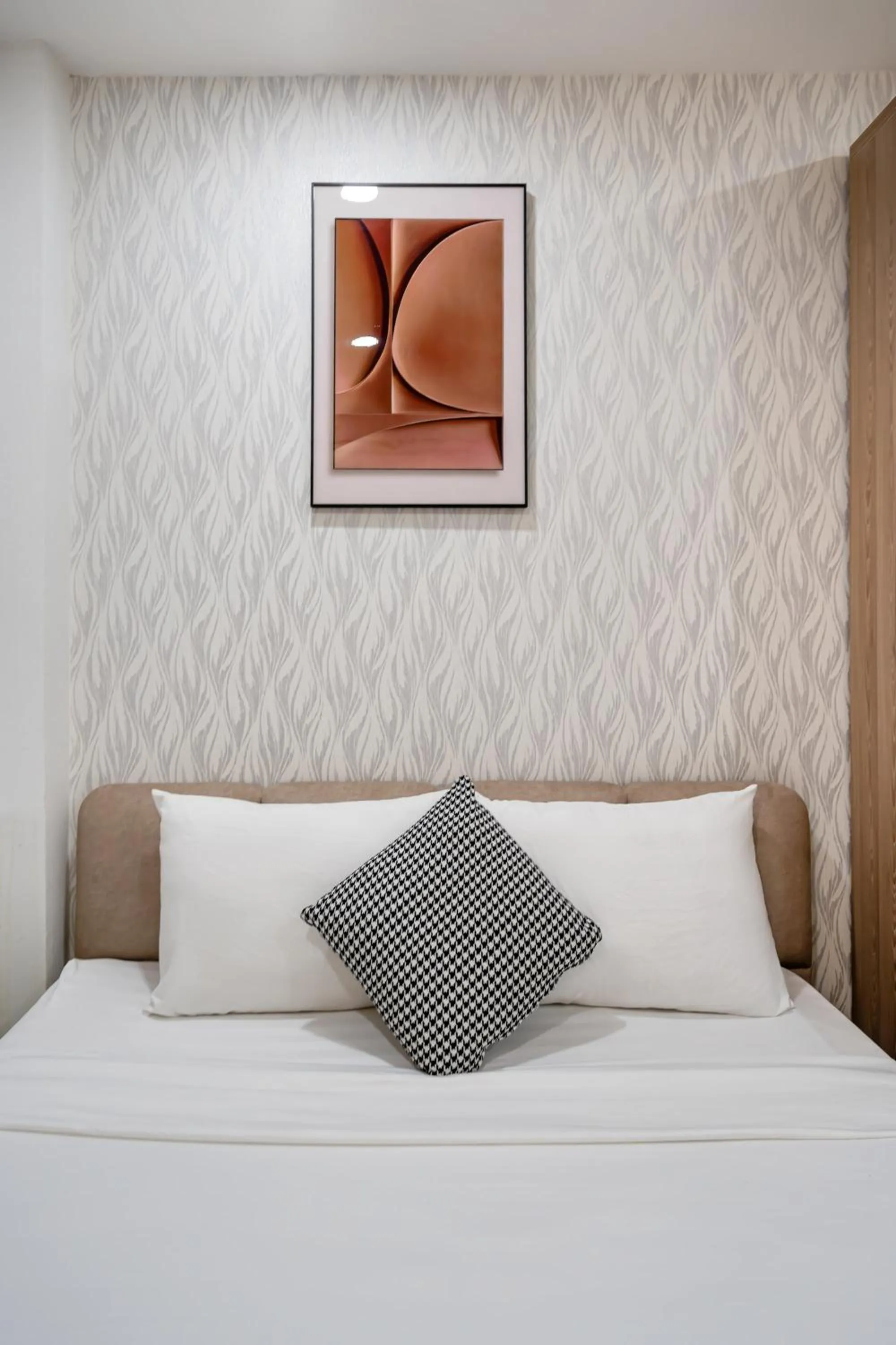 Bed in Lotus Lalala Inn Hotel