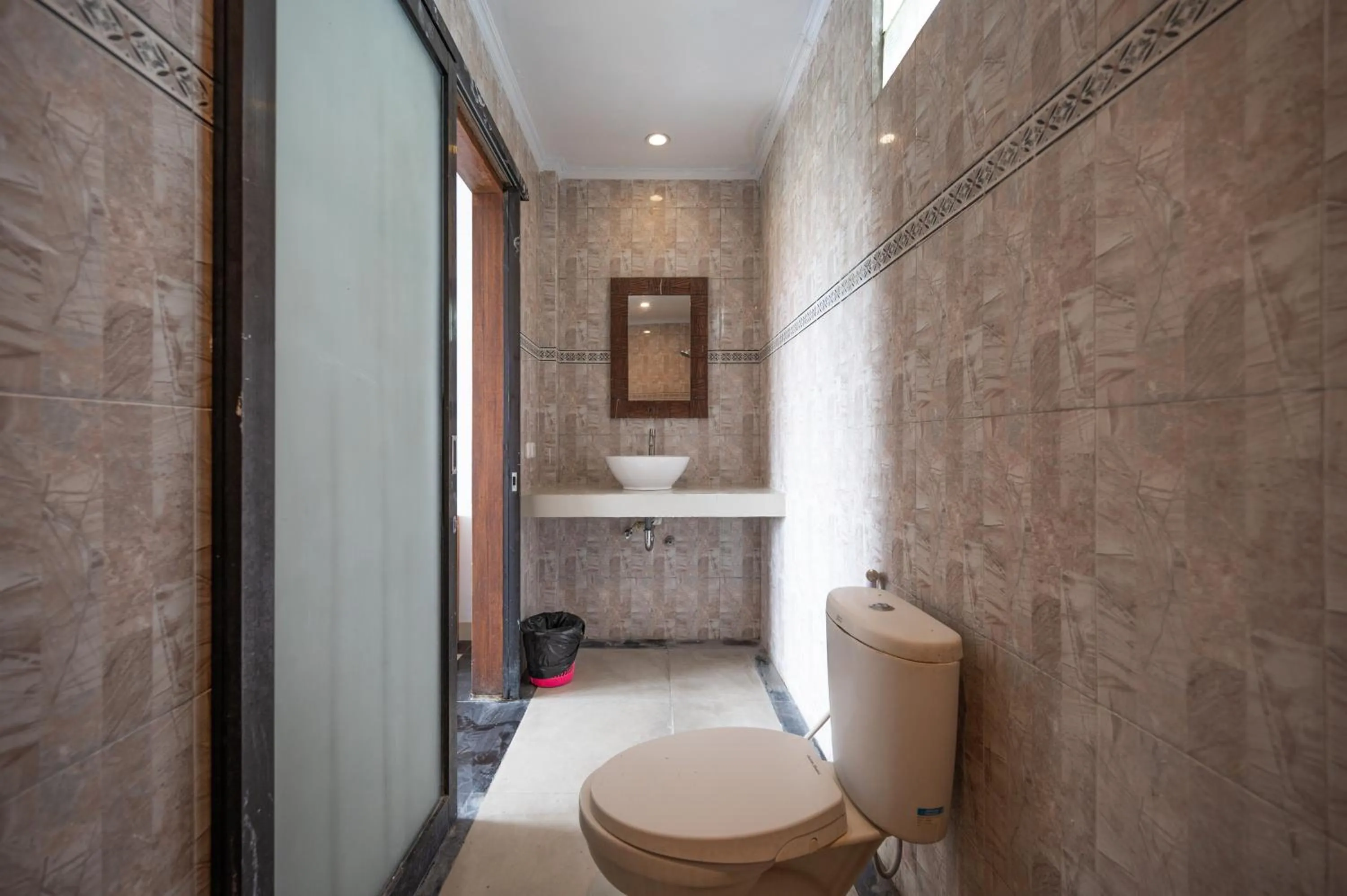 Bathroom in Agung Homestay Canggu Mitra RedDoorz