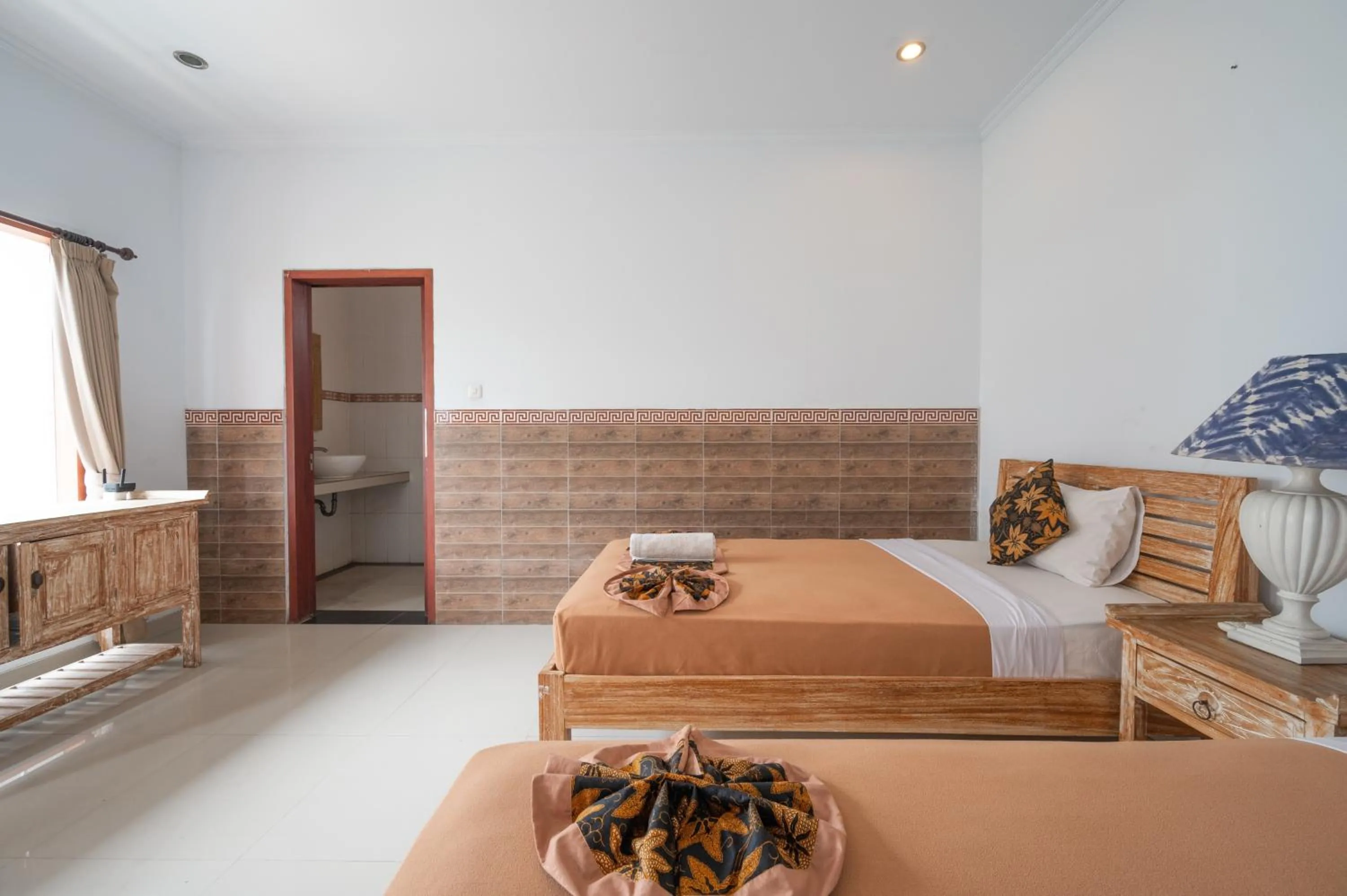 Bedroom, Bed in Agung Homestay Canggu Mitra RedDoorz