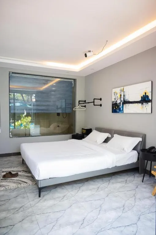 Bed in The L Boutique Tz