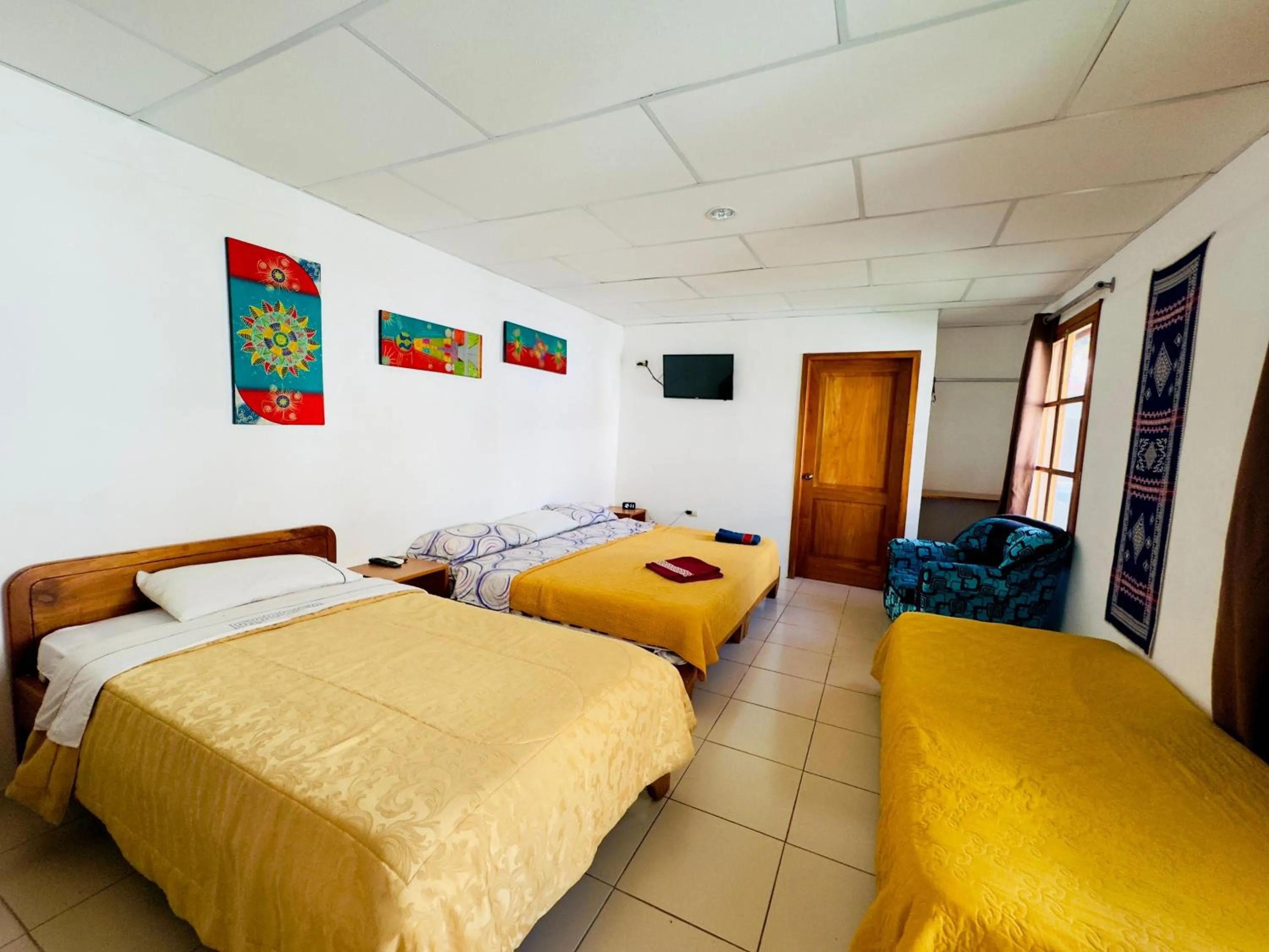 Bed in The Galapagos Pearl B&B