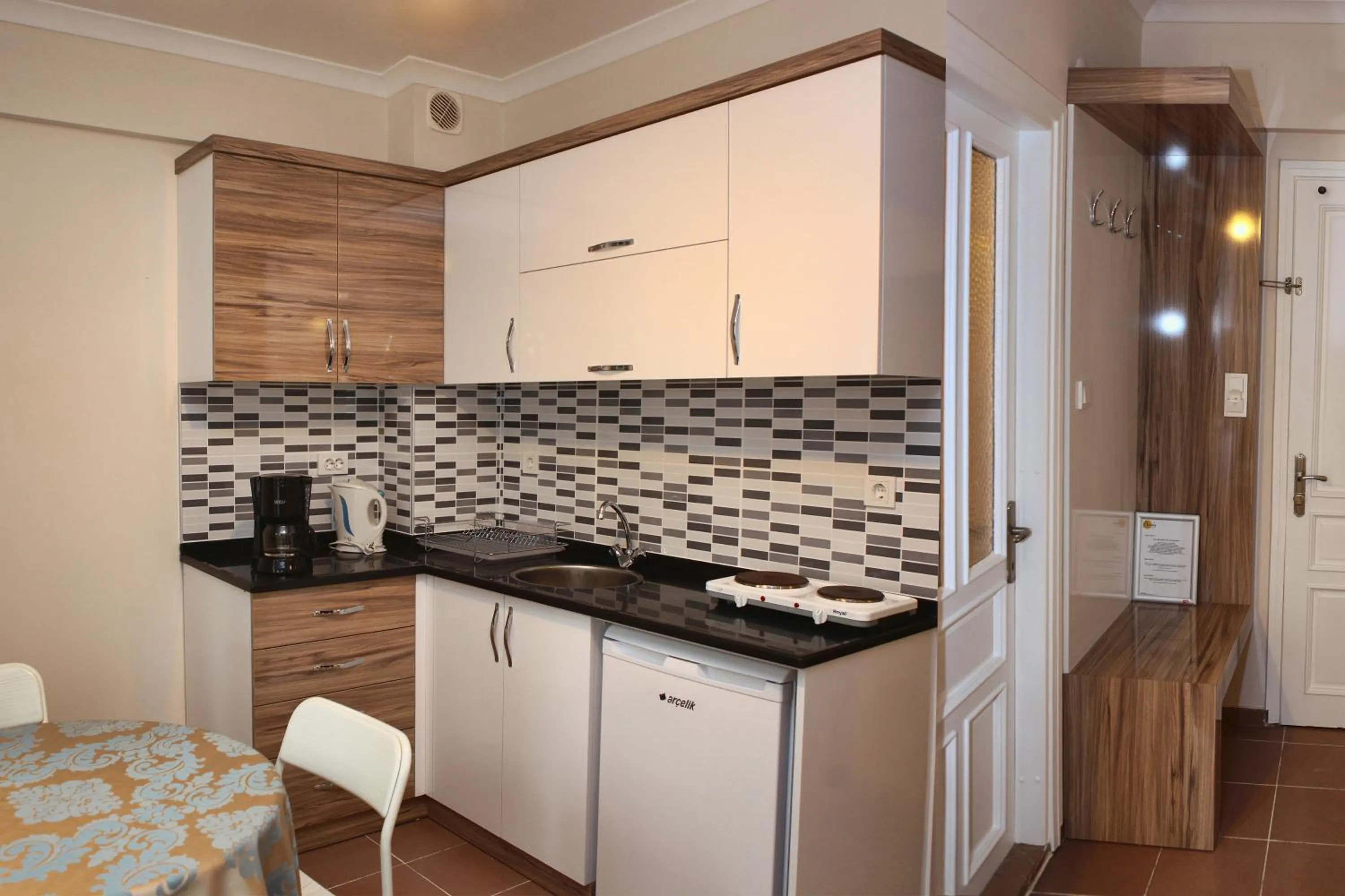 Kitchen or kitchenette in Narcis Apart Hotel